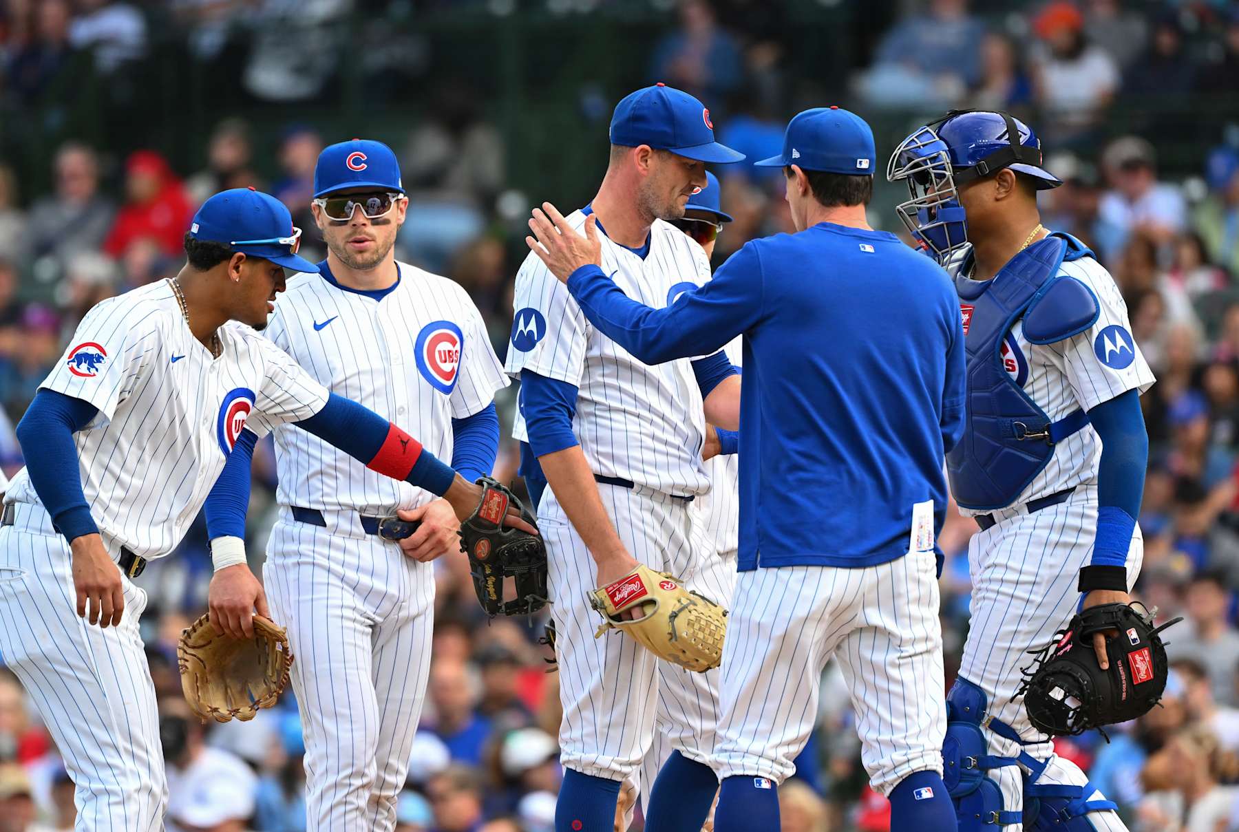 CHICAGO, ILLINOIS - SEPTEMBER 29: Manager Craig Counsell #30 of the Chicago Cubs removes Drew Smyly #11 of the Chicago Cubs during the eighth inning of a game against the Cincinnati Reds at Wrigley Field on September 29, 2024 in Chicago, Illinois. (Photo by Nuccio DiNuzzo/Getty Images)
