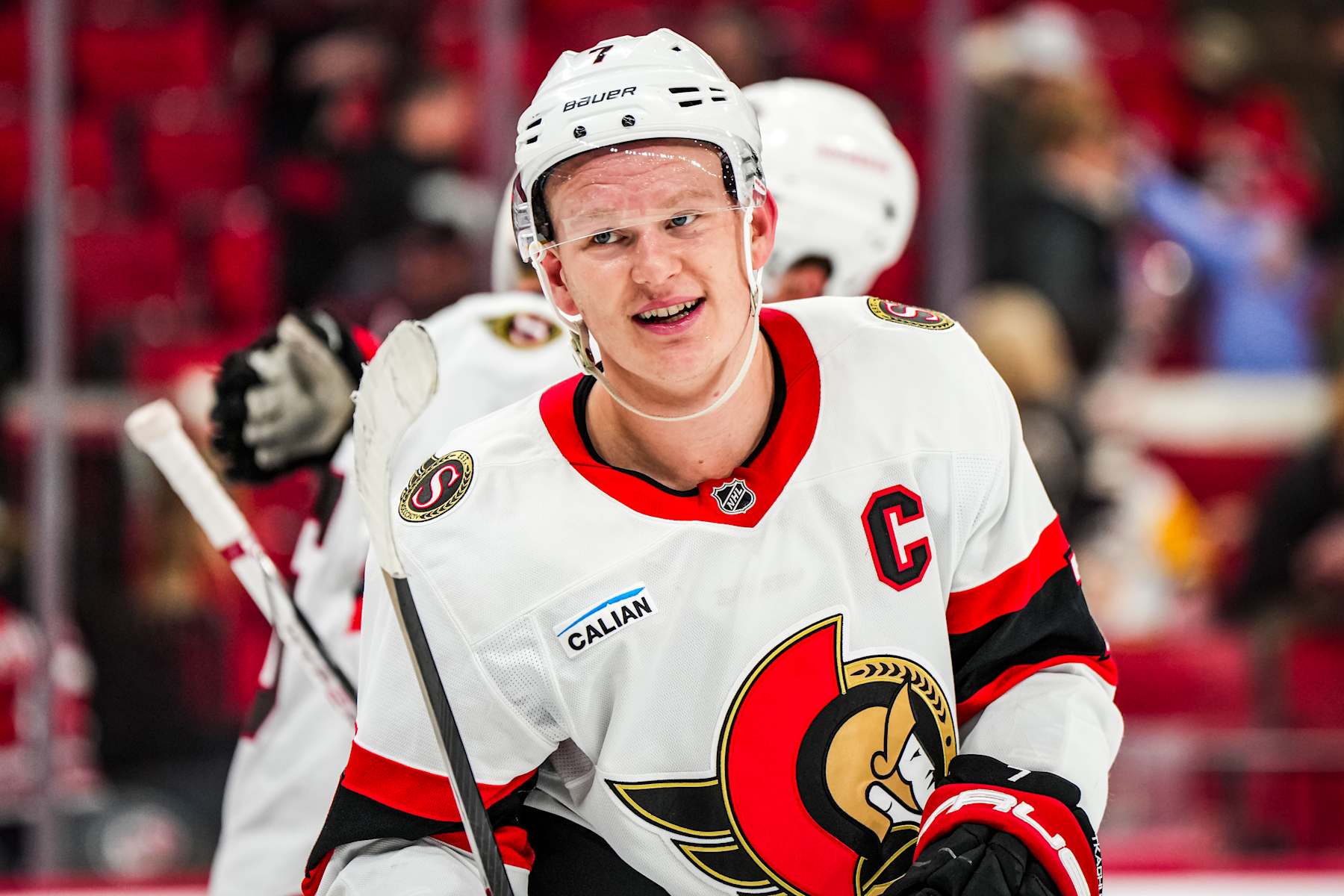 RALEIGH, NORTH CAROLINA - DECEMBER 13: Brady Tkachuk #7 of the Ottawa Senators reacts after a 3-0 victory against the Carolina Hurricanes at Lenovo Center on December 13, 2024 in Raleigh, North Carolina. (Photo by Cato Cataldo/NHLI via Getty Images)