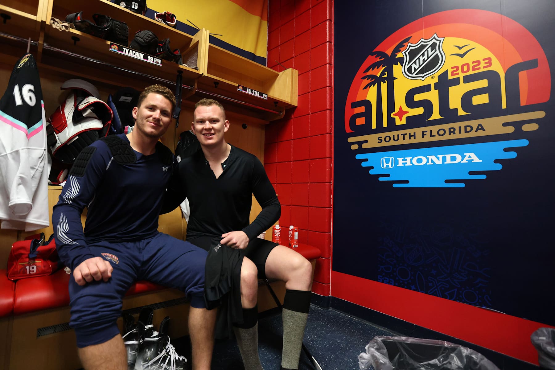 SUNRISE, FLORIDA - FEBRUARY 04: (L-R) Brothers Matthew Tkachuk #19 of the Florida Panthers and Brady Tkachuk #7 of the Ottawa Senators get ready in the locker room prior to the 2023 Honda NHL All-Star game at FLA Live Arena on February 04, 2023 in Sunrise, Florida. (Photo by Dave Sandford/NHLI via Getty Images)