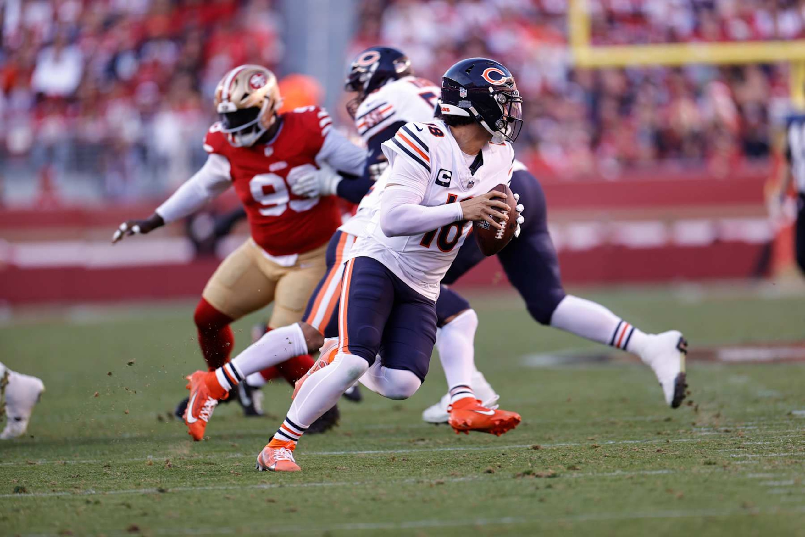SANTA CLARA, CA - DECEMBER 8: Caleb Williams #18 of the Chicago Bears looks for a receiver during the game against the San Francisco 49ers at Levi's Stadium on December 8, 2024 in Santa Clara, California. The 49ers defeated the Bears 38-13. (Photo by Michael Zagaris/San Francisco 49ers/Getty Images)