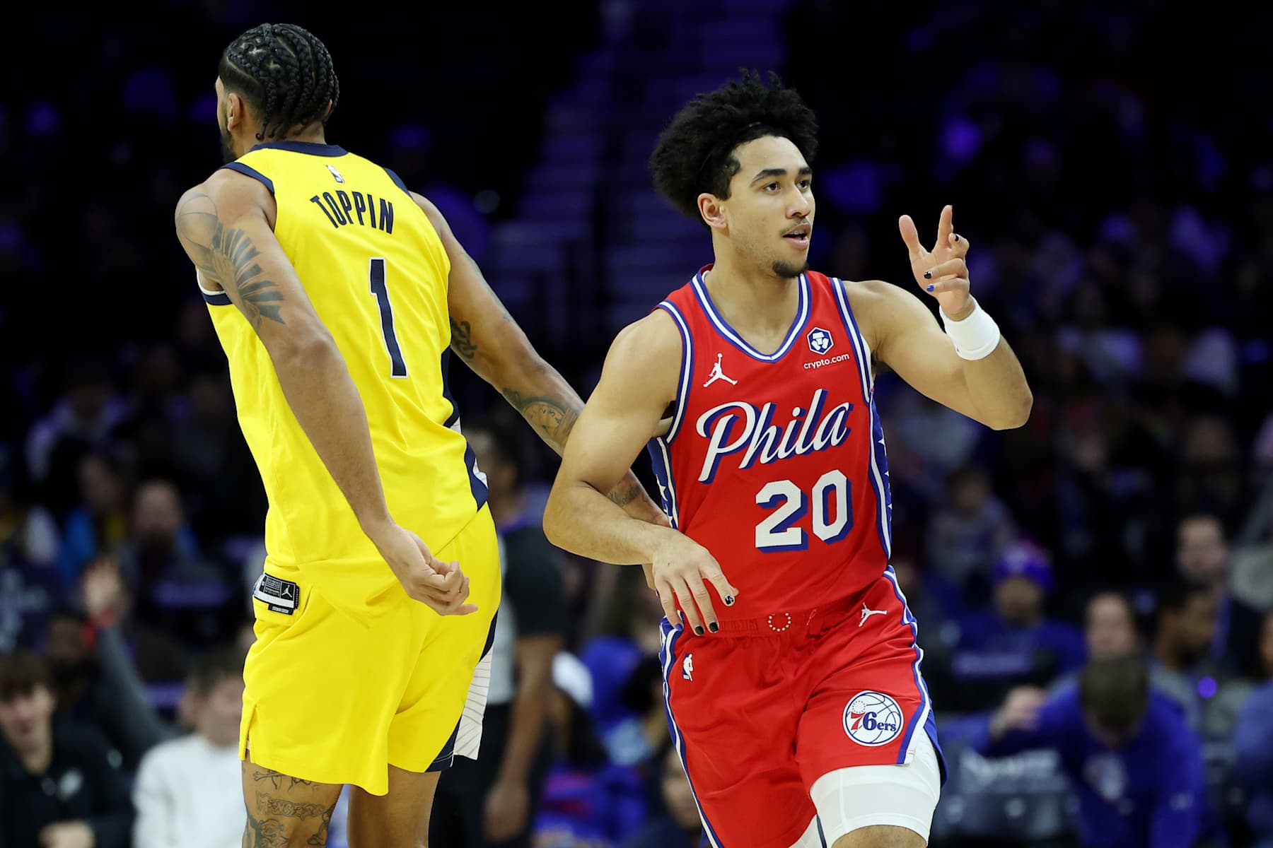 PHILADELPHIA, PENNSYLVANIA - DECEMBER 13: Jared McCain #20 of the Philadelphia 76ers celebrates a three-pointer during the first half against the Indiana Pacers at the Wells Fargo Center on December 13, 2024 in Philadelphia, Pennsylvania. NOTE TO USER: User expressly acknowledges and agrees that, by downloading and or using this photograph, User is consenting to the terms and conditions of the Getty Images License Agreement. (Photo by Emilee Chinn/Getty Images)