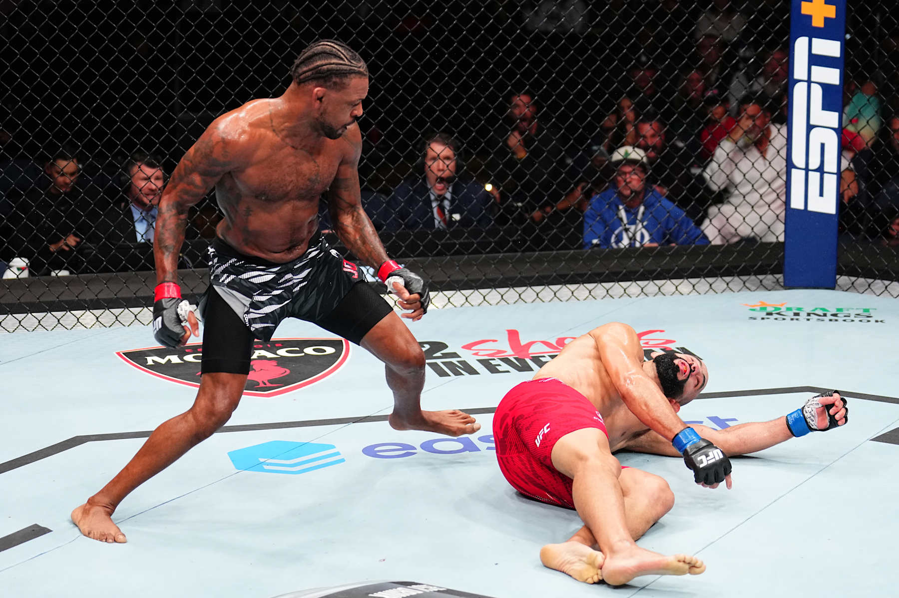 TAMPA, FLORIDA - DECEMBER 14: Michael Johnson knocks out Ottman Azaitar of Morocco in a lightweight fight during the UFC Fight Night event at Amalie Arena on December 14, 2024 in Tampa, Florida. (Photo by Chris Unger/Zuffa LLC)