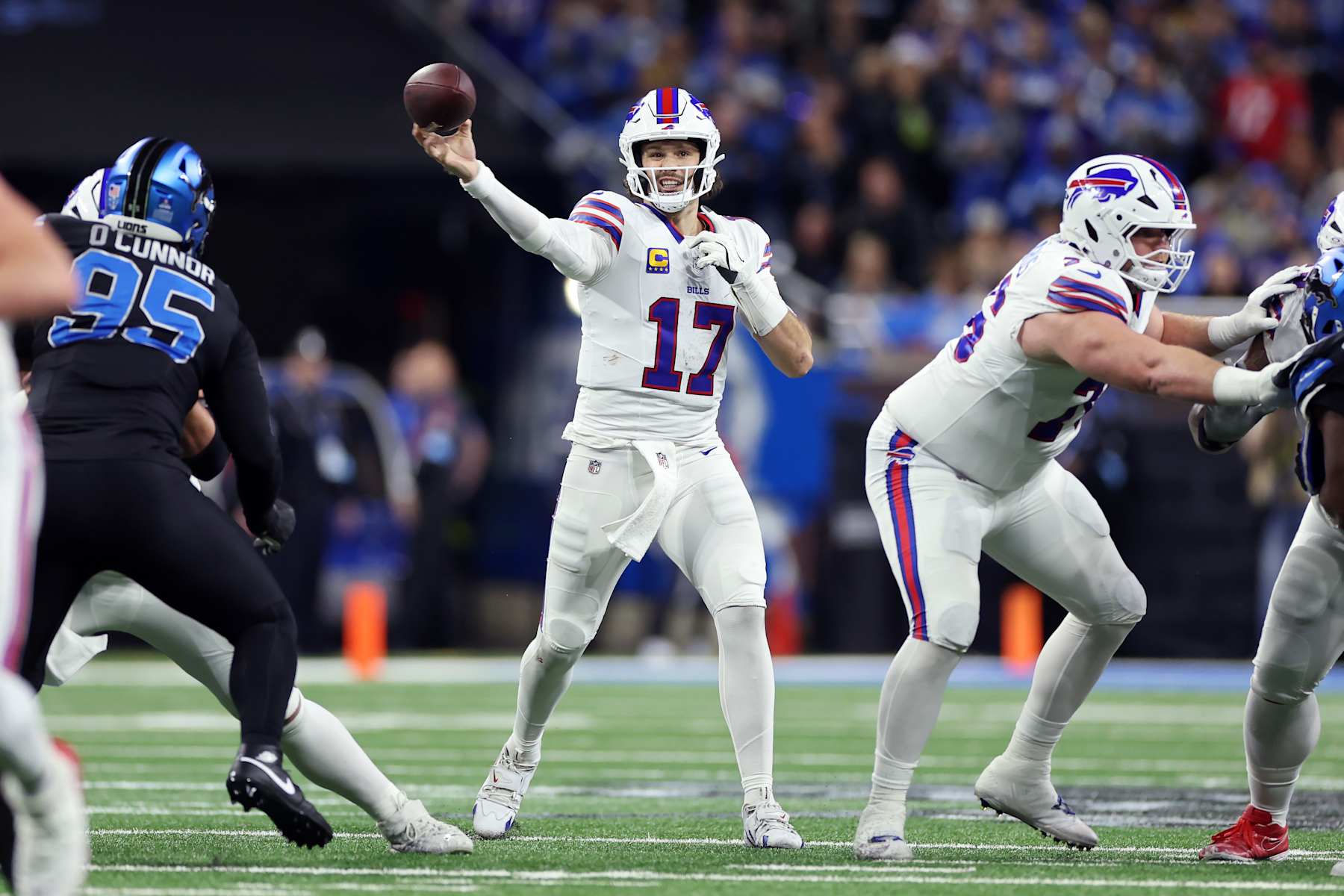 DETROIT, MICHIGAN - DECEMBER 15: Josh Allen #17 of the Buffalo Bills throws a pass in the first quarter against the Detroit Lions at Ford Field on December 15, 2024 in Detroit, Michigan. (Photo by Mike Mulholland/Getty Images)