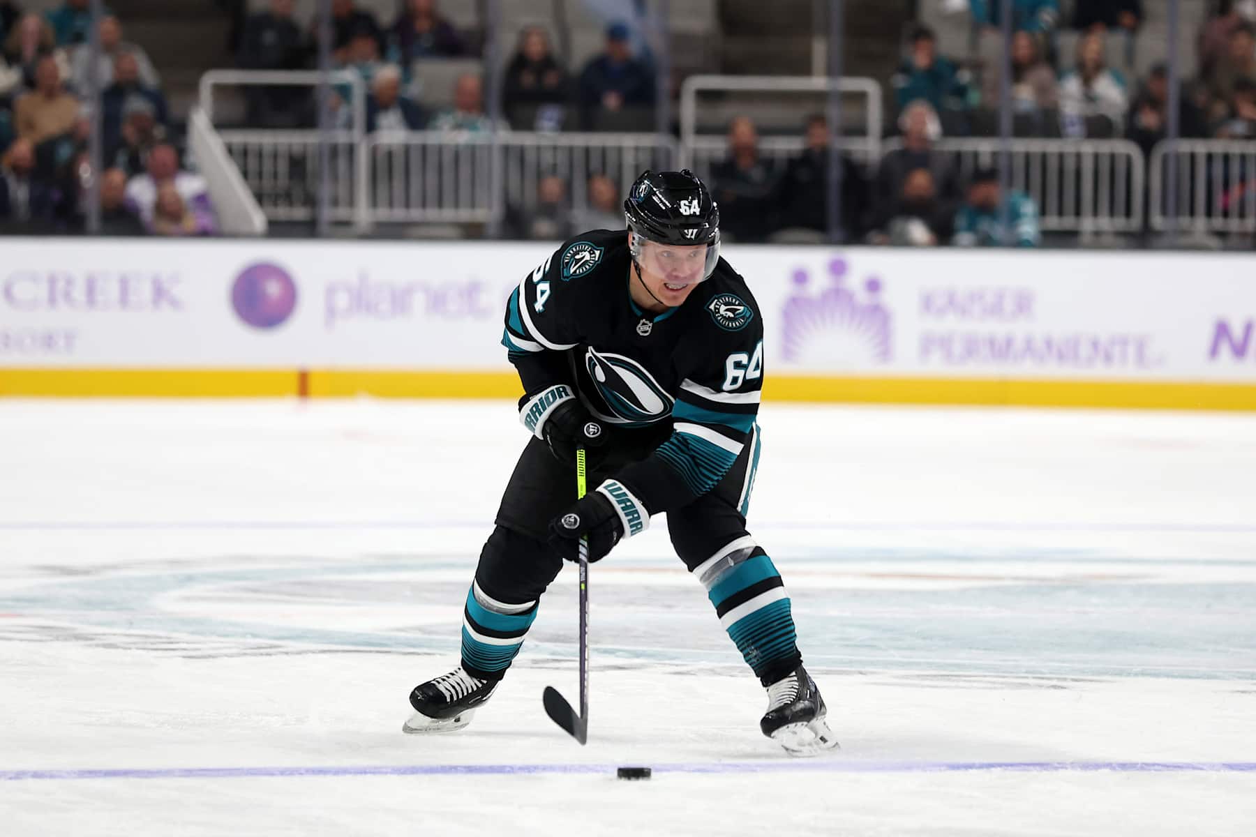 SAN JOSE, CALIFORNIA - NOVEMBER 07: Mikael Granlund #64 of the San Jose Sharks in action against the Minnesota Wild at SAP Center on November 07, 2024 in San Jose, California. (Photo by Ezra Shaw/Getty Images)