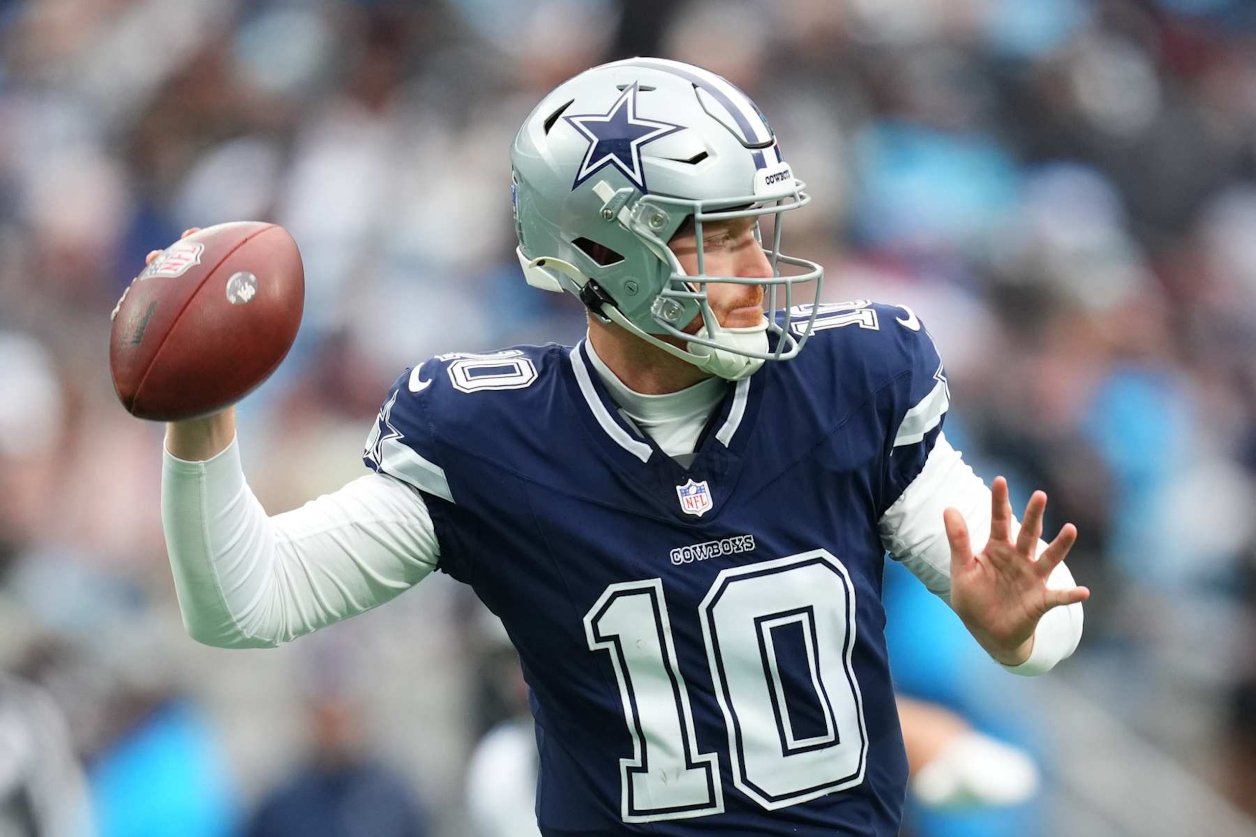 CHARLOTTE, NORTH CAROLINA - DECEMBER 15: Cooper Rush #10 of the Dallas Cowboys looks to pass against the Carolina Panthers during the second quarter at Bank of America Stadium on December 15, 2024 in Charlotte, North Carolina. (Photo by Grant Halverson/Getty Images)
