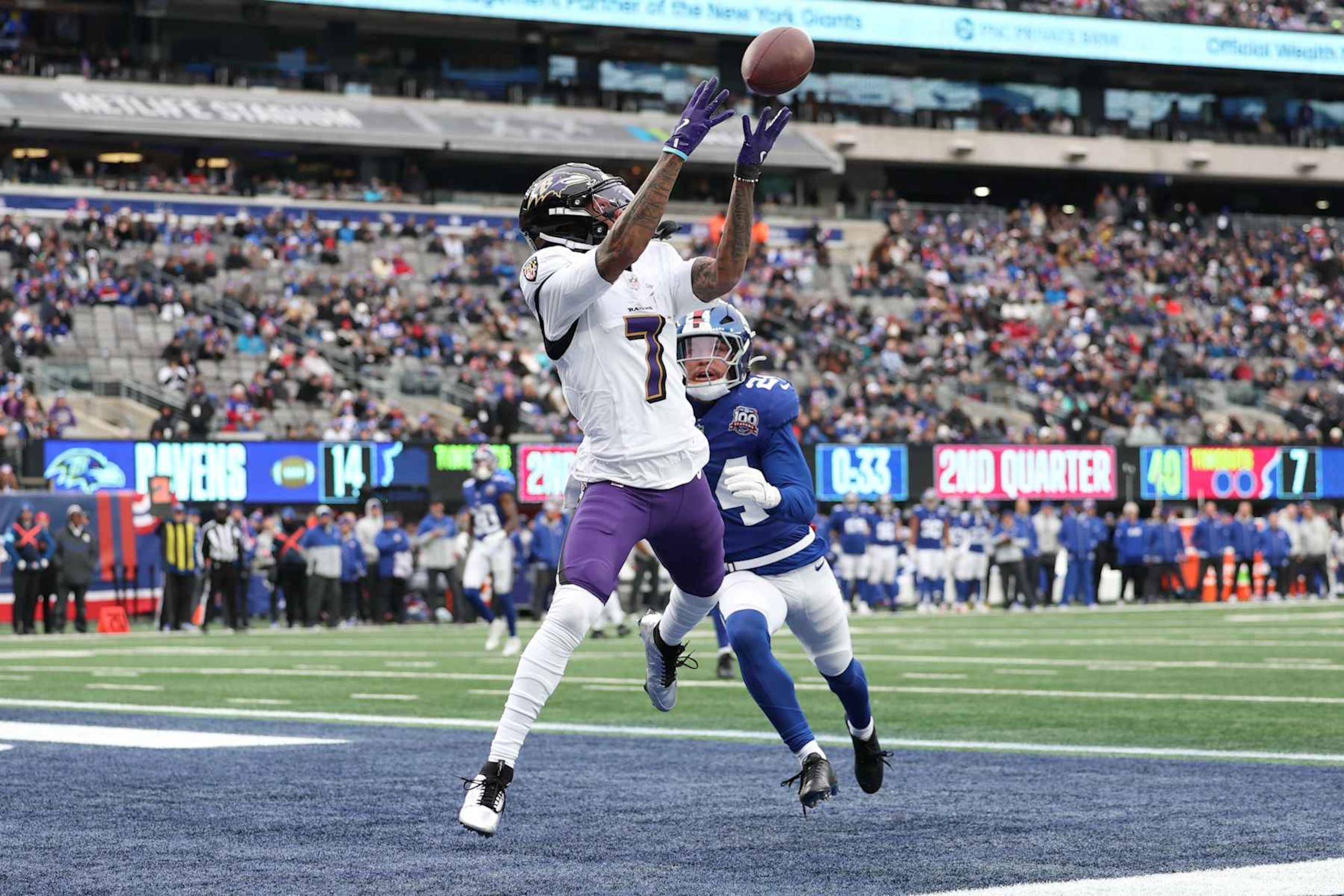 EAST RUTHERFORD, NEW JERSEY - DECEMBER 15: Rashod Bateman #7 of the Baltimore Ravens catches a touchdown pass during the second quarter against the New York Giants at MetLife Stadium on December 15, 2024 in East Rutherford, New Jersey. (Photo by Luke Hales/Getty Images)