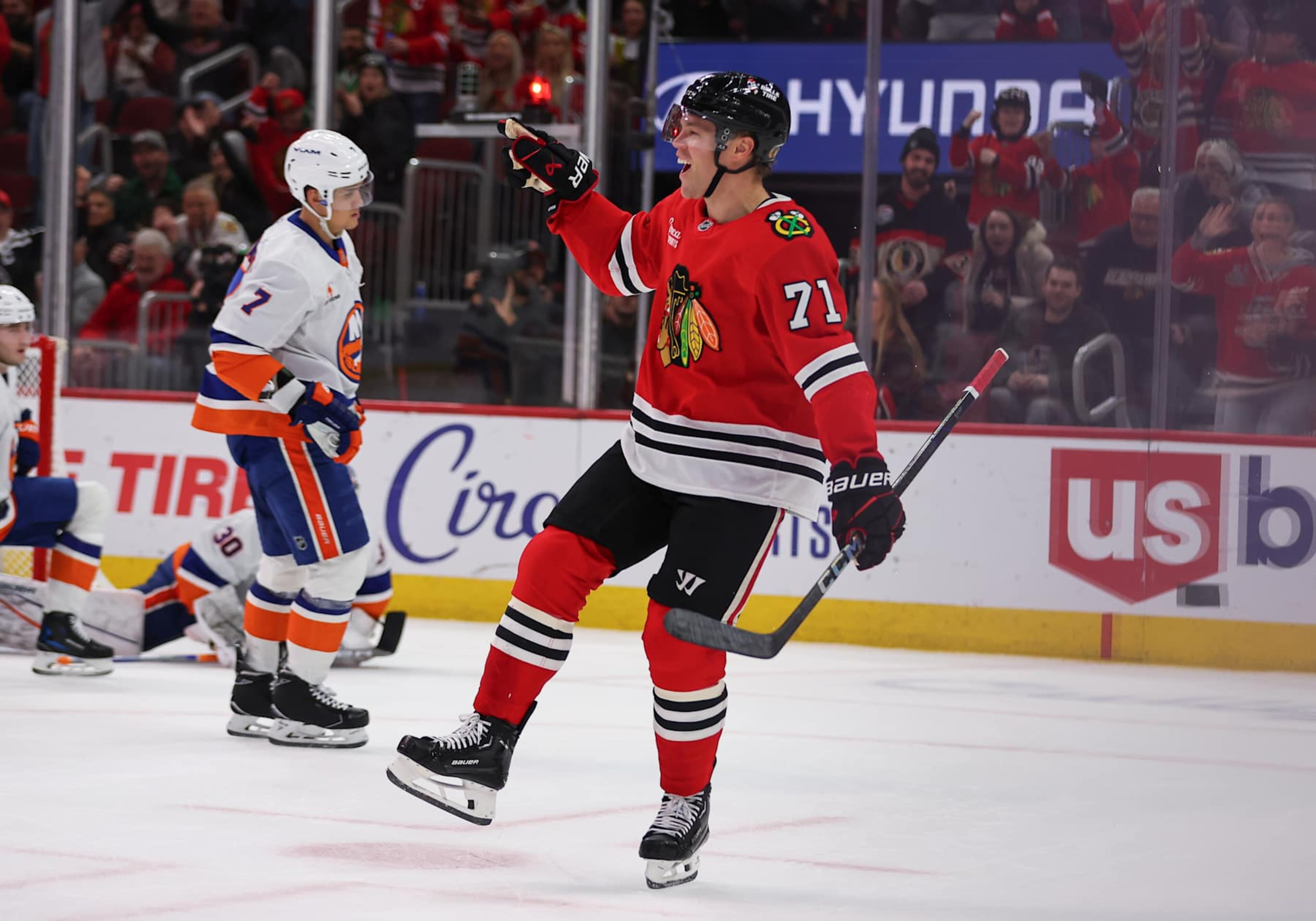 CHICAGO, IL - DECEMBER 15: Taylor Hall #71 of the Chicago Blackhawks celebrates after scoring a goal during the first period against the New York Islanders on December 15, 2024 at the United Center in Chicago, Illinois. (Photo by Melissa Tamez/Icon Sportswire via Getty Images) CHICAGO, IL - DECEMBER 15: Taylor Hall #71 of the Chicago Blackhawks celebrates after scoring a goal during the first period against the New York Islanders on December 15, 2024 at the United Center in Chicago, Illinois. (Photo by Melissa Tamez/Icon Sportswire via Getty Images)