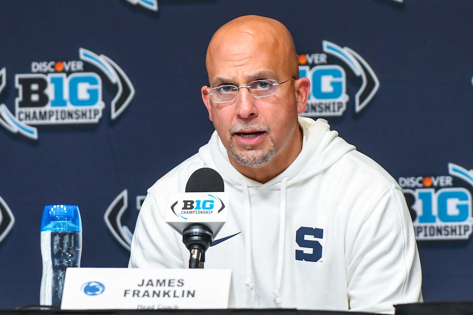 INDIANAPOLIS, INDIANA - DECEMBER 07: Head Football Coach James Franklin of the Penn State Nittany Lions speaks to media during the post game press conference after the 2024 Big Ten Football Championship game against the Oregon Ducks at Lucas Oil Stadium on December 07, 2024 in Indianapolis, Indiana. The Oregon Ducks won the game 45-37. (Photo by Aaron J. Thornton/Getty Images)