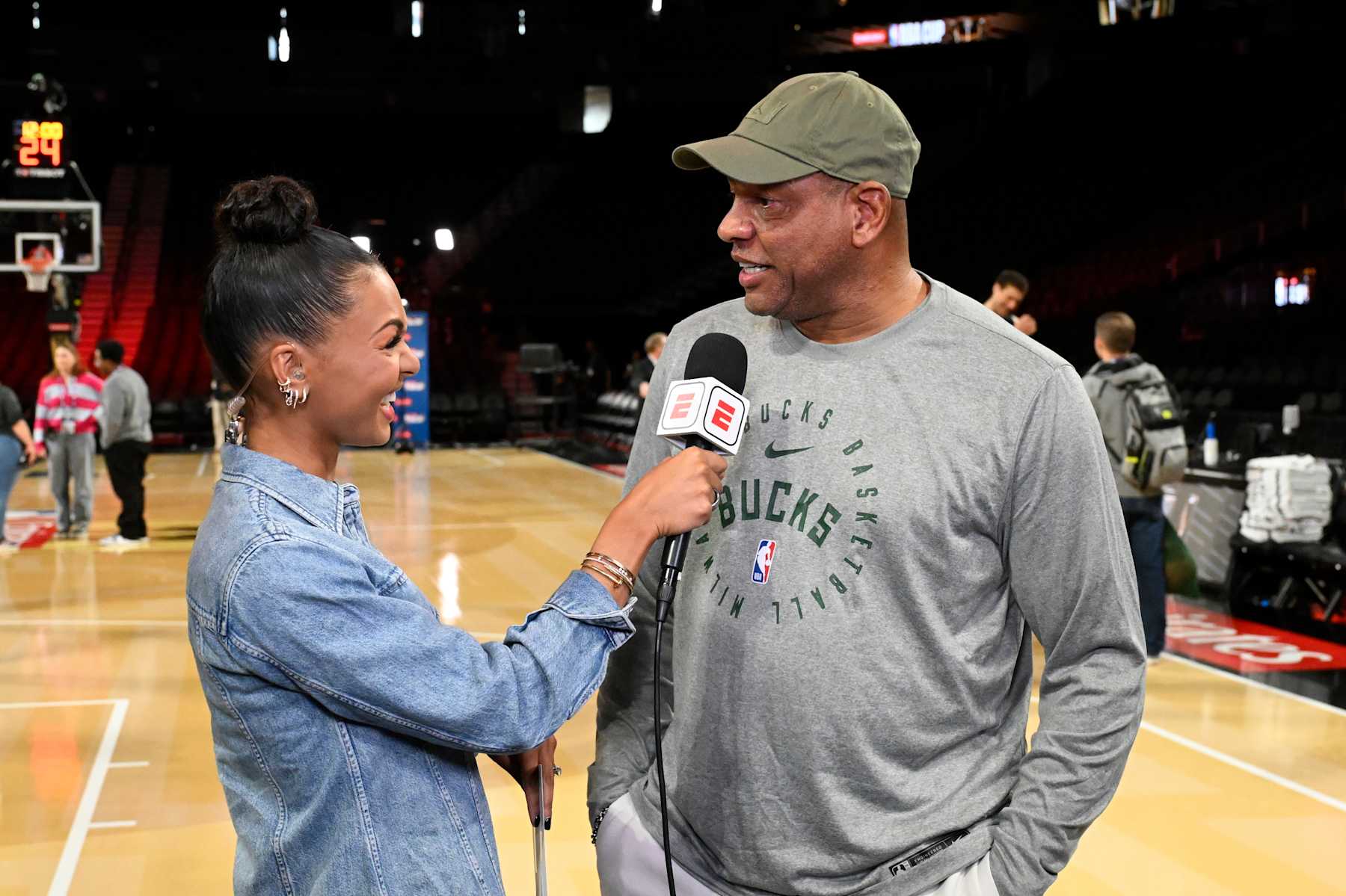 LAS VEGAS, NV - DECEMBER 16: Malika Andrews of ESPN speaks with Head Coach Doc Rivers of the Milwaukee Bucks during practice and media availability as part of the 2024 Emirates NBA Cup on December 16, 2024 at T-Mobile Arena in Las Vegas, Nevada. NOTE TO USER: User expressly acknowledges and agrees that, by downloading and or using this photograph, user is consenting to the terms and conditions of Getty Images License Agreement. Mandatory Copyright Notice: Copyright 2024 NBAE (Photo by David Dow/NBAE via Getty Images)