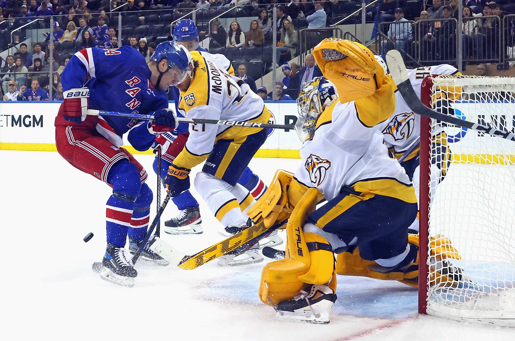 NEW YORK, NEW YORK - OCTOBER 19: Kaapo Kakko #24 of the New York Rangers is stopped by Juuse Saros #74 of the Nashville Predators at Madison Square Garden on October 19, 2023 in New York City. The Predators defeated the Rangers 4-1. (Photo by Bruce Bennett/Getty Images)