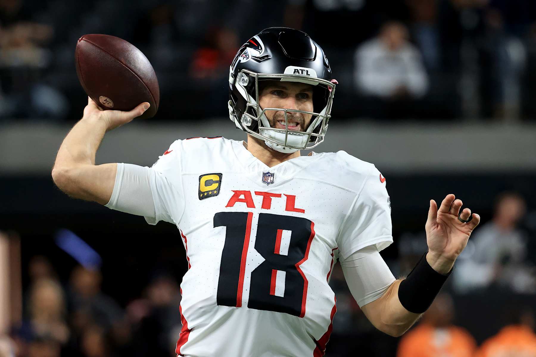 LAS VEGAS, NEVADA - DECEMBER 16: Kirk Cousins #18 of the Atlanta Falcons warms up prior to the game against the Las Vegas Raiders at Allegiant Stadium on December 16, 2024 in Las Vegas, Nevada. (Photo by Ian Maule/Getty Images)