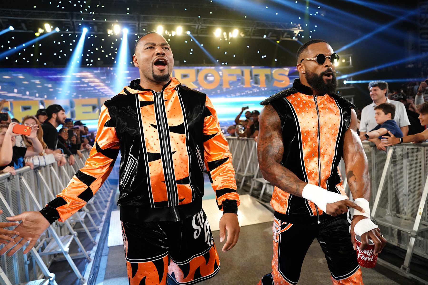 NASHVILLE, TENNESSEE - OCTOBER 4: (L-R) Angelo Dawkins and Montez Ford of the Street Profits make their entrance during WWE SmackDown at Bridgestone Arena on October 4, 2024 in Nashville, Tennessee. (Photo by WWE/Getty Images)