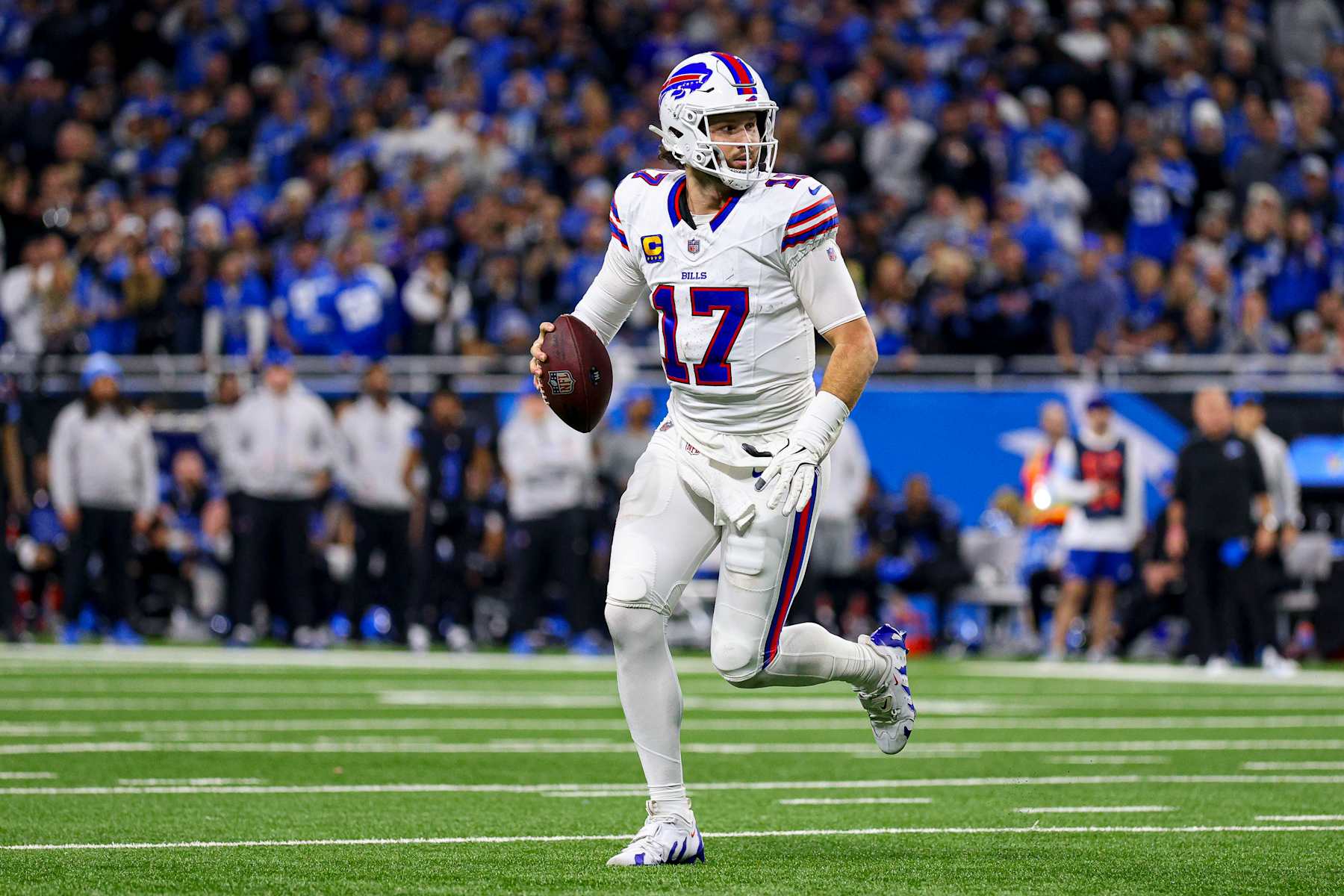 DETROIT, MICHIGAN - DECEMBER 15: Josh Allen #17 of the Buffalo Bills scrambles in the second quarter of a game against the Detroit Lions at Ford Field on December 15, 2024 in Detroit, Michigan. (Photo by Mike Mulholland/Getty Images)