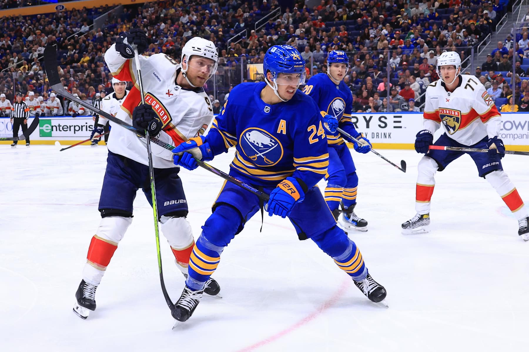 Florida Panthers center Sam Bennett (left) and Buffalo Sabres center Dylan Cozens.
