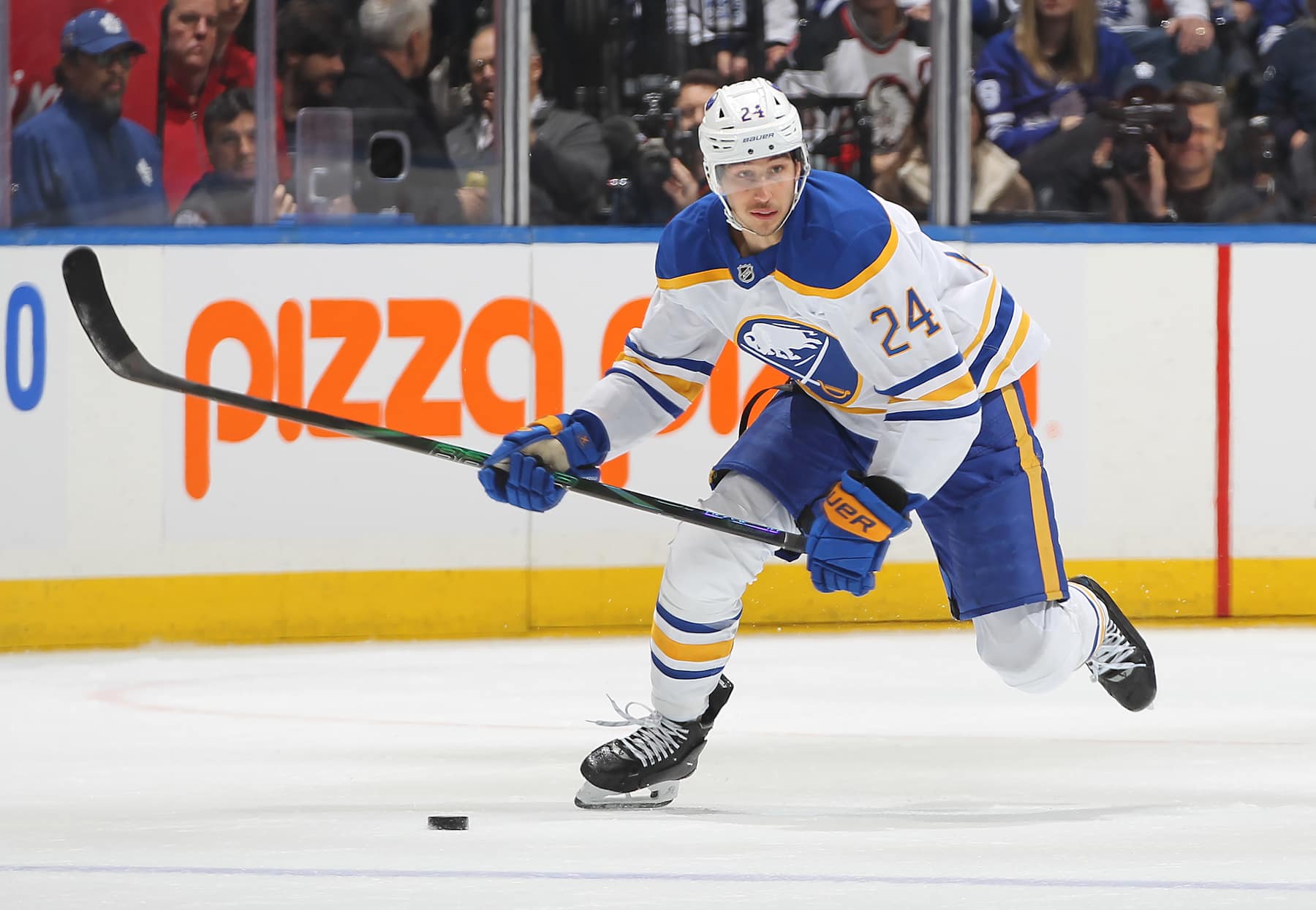 TORONTO, CANADA - DECEMBER 15: Dylan Cozens #24 of the Buffalo Sabres skates with the puck against the Toronto Maple Leafs during the first period in an NHL game at Scotiabank Arena on December 15, 2024 in Toronto, Ontario, Canada. (Photo by Claus Andersen/Getty Images)