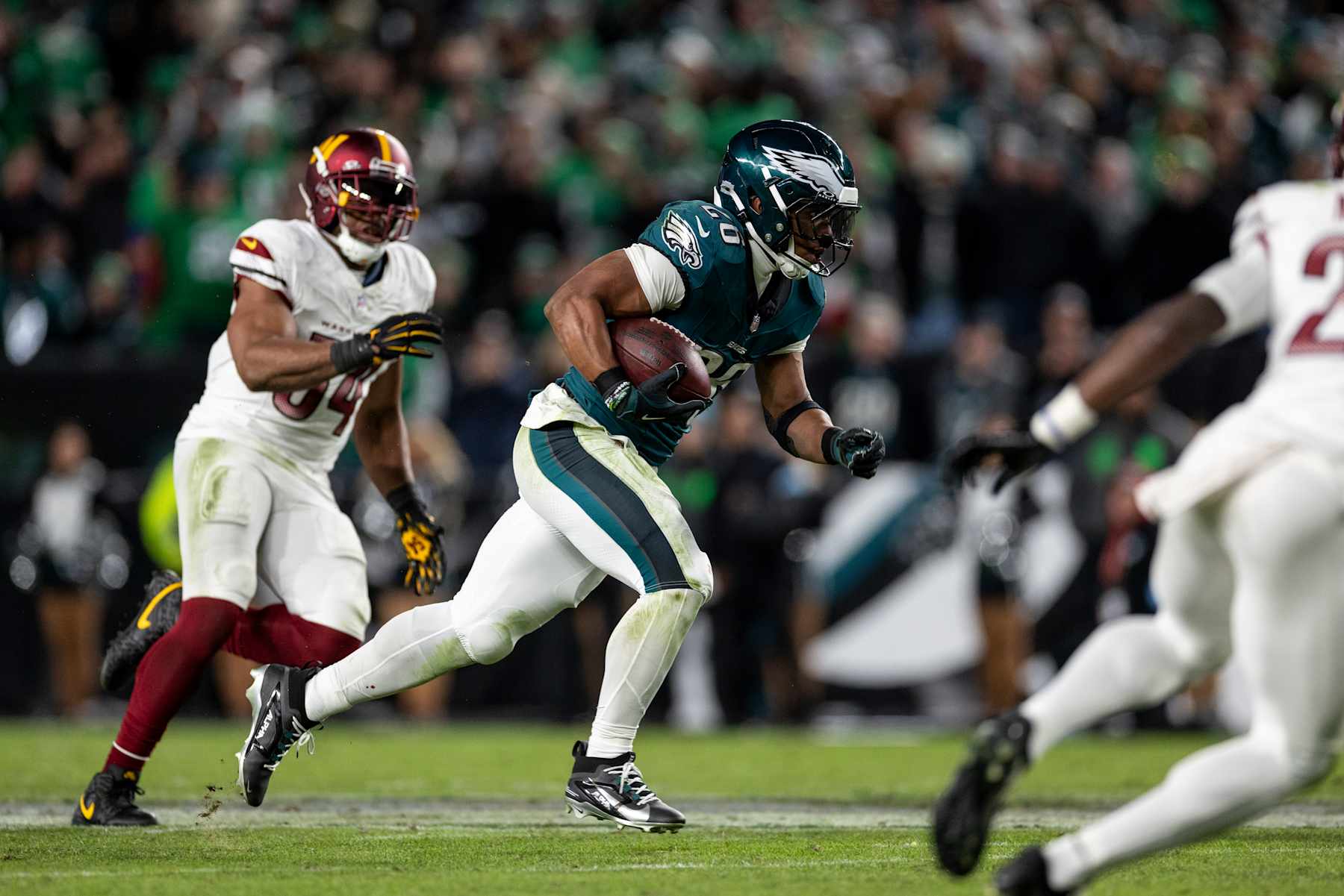 PHILADELPHIA, PENNSYLVANIA - NOVEMBER 14: Saquon Barkley #26 of the Philadelphia Eagles runs with the ball during an NFL Football game against the Washington Commanders at Lincoln Financial Field on November 14, 2024 in Philadelphia, Pennsylvania. (Photo by Michael Owens/Getty Images)