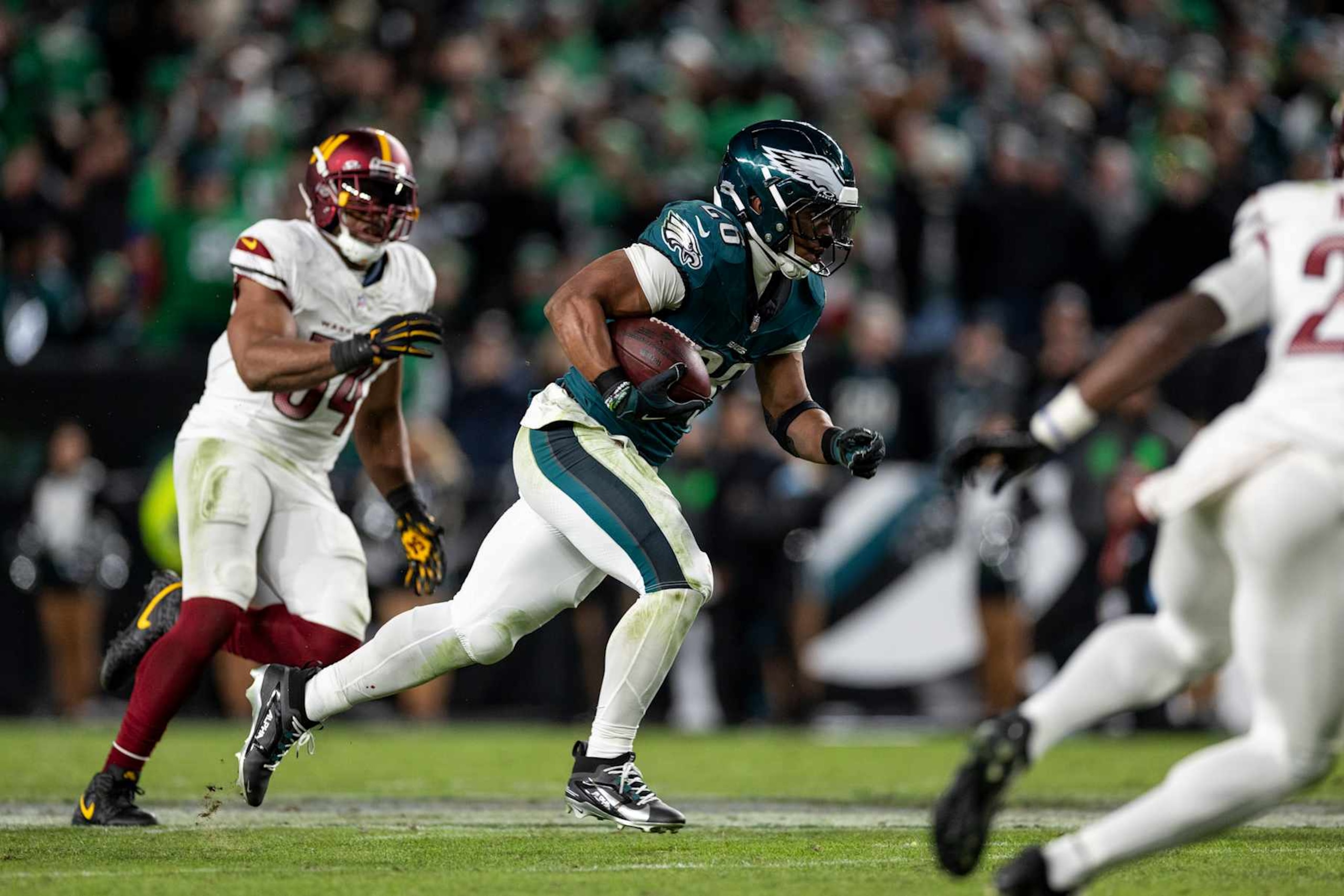 PHILADELPHIA, PENNSYLVANIA - NOVEMBER 14: Saquon Barkley #26 of the Philadelphia Eagles runs with the ball during an NFL Football game against the Washington Commanders at Lincoln Financial Field on November 14, 2024 in Philadelphia, Pennsylvania. (Photo by Michael Owens/Getty Images)