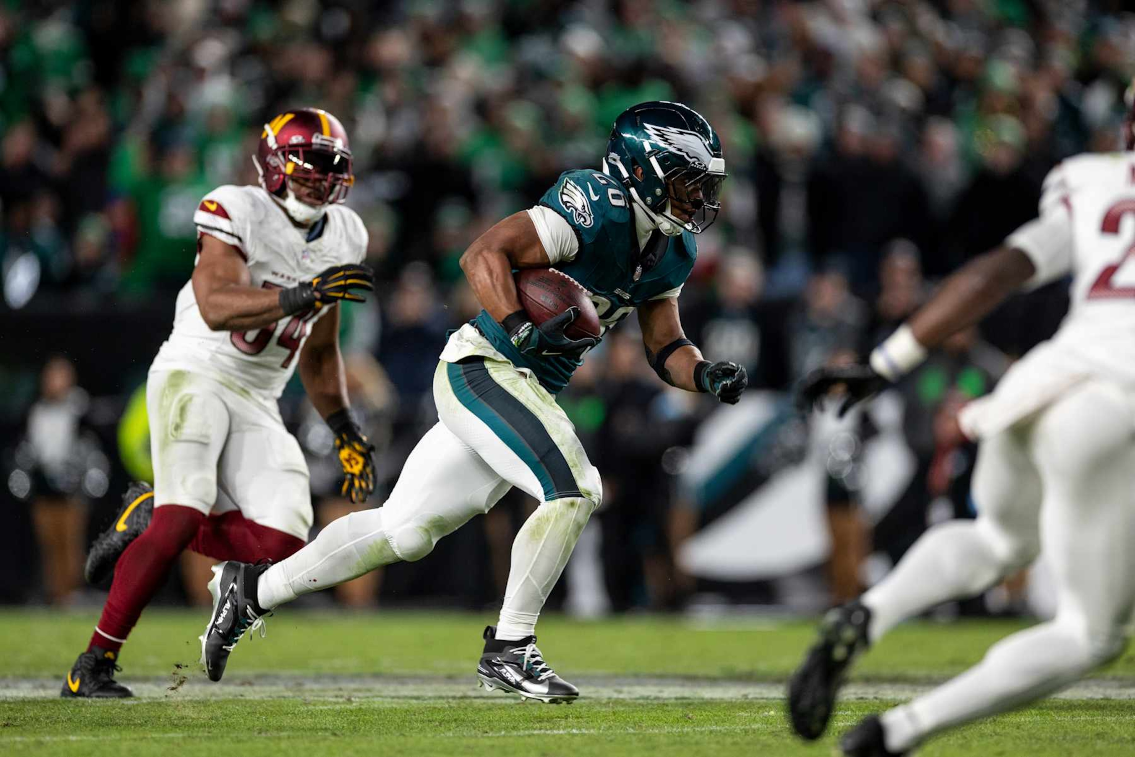 PHILADELPHIA, PENNSYLVANIA - NOVEMBER 14: Saquon Barkley #26 of the Philadelphia Eagles runs with the ball during an NFL Football game against the Washington Commanders at Lincoln Financial Field on November 14, 2024 in Philadelphia, Pennsylvania. (Photo by Michael Owens/Getty Images)