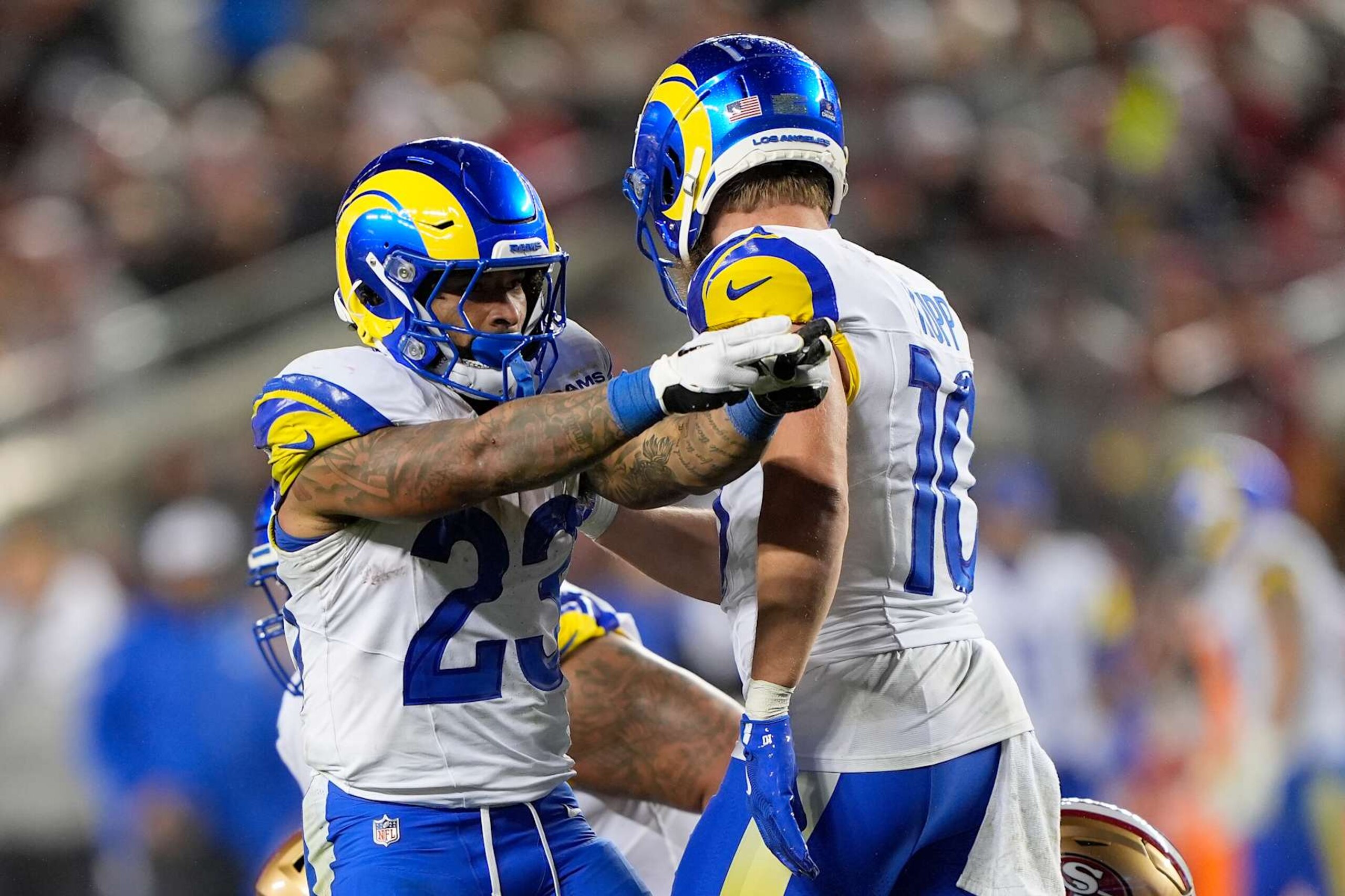 SANTA CLARA, CALIFORNIA - DECEMBER 12: Kyren Williams #23 of the Los Angeles Rams celebrates with Cooper Kupp #10 after a first down against the San Francisco 49ers during the third quarter in the game at Levi's Stadium on December 12, 2024 in Santa Clara, California. (Photo by Thearon W. Henderson/Getty Images)