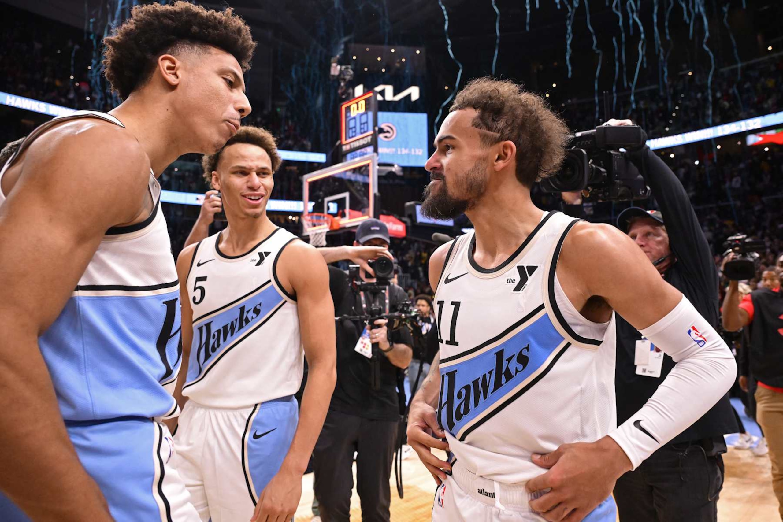 ATLANTA, GA - DECEMBER 6:  Jalen Johnson #1, Dyson Daniels #5 and Trae Young #11 of the Atlanta Hawks celebrates after the game against the Los Angeles Lakers on December 6, 2024 at State Farm Arena in Atlanta, Georgia.  NOTE TO USER: User expressly acknowledges and agrees that, by downloading and/or using this Photograph, user is consenting to the terms and conditions of the Getty Images License Agreement. Mandatory Copyright Notice: Copyright 2024 NBAE (Photo by Adam Hagy/NBAE via Getty Images)