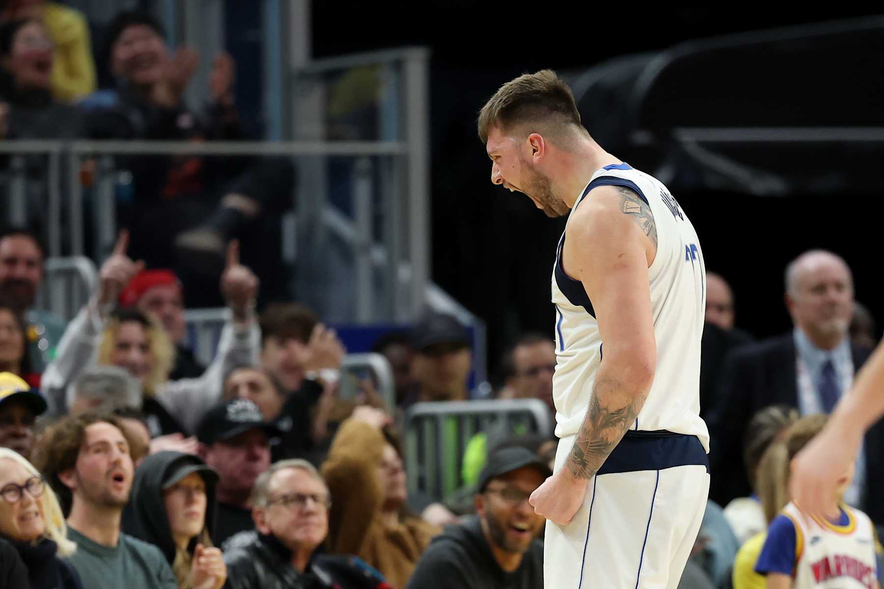SAN FRANCISCO, CALIFORNIA - DECEMBER 15: Luka Doncic #77 of the Dallas Mavericks reacts after he made a basket against the Golden State Warriors at Chase Center on December 15, 2024 in San Francisco, California.  NOTE TO USER: User expressly acknowledges and agrees that, by downloading and/or using this photograph, user is consenting to the terms and conditions of the Getty Images License Agreement.   (Photo by Ezra Shaw/Getty Images)