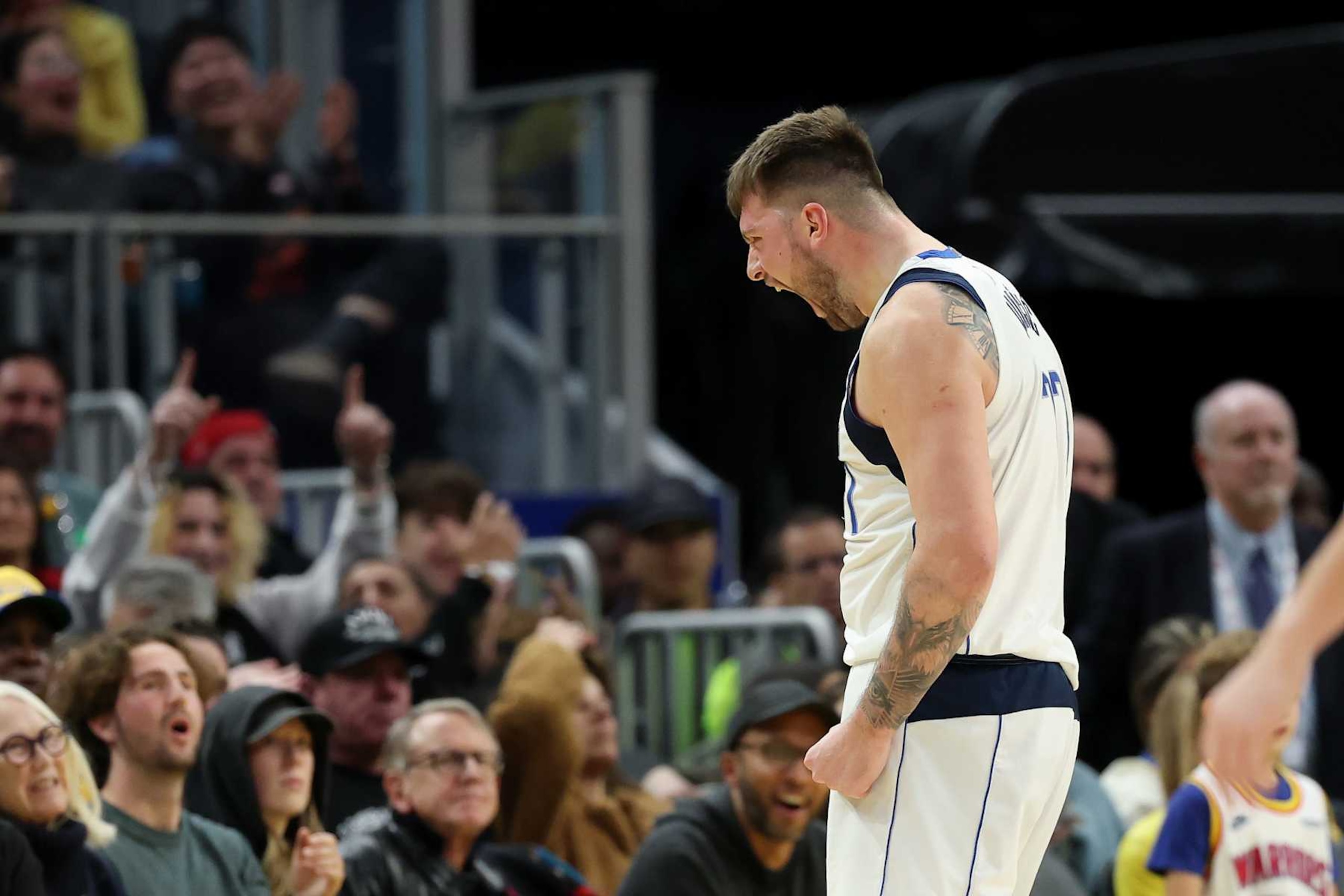 SAN FRANCISCO, CALIFORNIA - DECEMBER 15: Luka Doncic #77 of the Dallas Mavericks reacts after he made a basket against the Golden State Warriors at Chase Center on December 15, 2024 in San Francisco, California.  NOTE TO USER: User expressly acknowledges and agrees that, by downloading and/or using this photograph, user is consenting to the terms and conditions of the Getty Images License Agreement.   (Photo by Ezra Shaw/Getty Images)