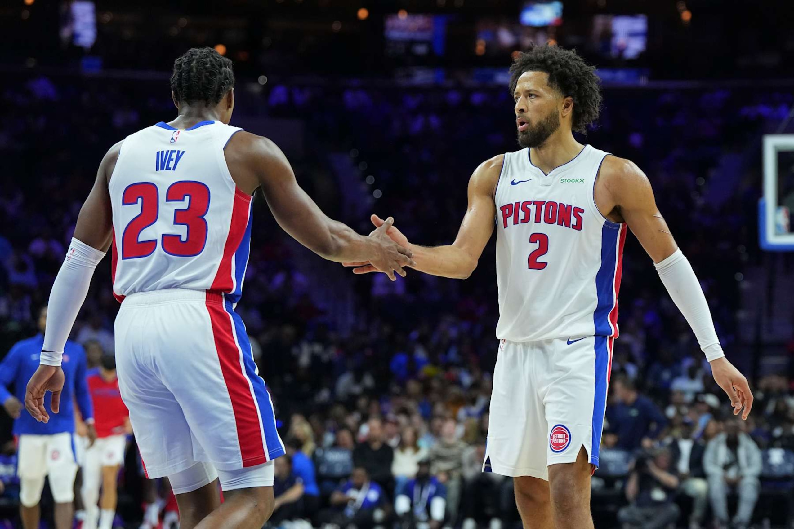 PHILADELPHIA, PENNSYLVANIA - OCTOBER 30: Jaden Ivey #23 of the Detroit Pistons celebrates with Cade Cunningham #2 against the Philadelphia 76ers at the Wells Fargo Center on October 30, 2024 in Philadelphia, Pennsylvania. The Pistons defeated the 76ers 105-95. NOTE TO USER: User expressly acknowledges and agrees that, by downloading and/or using this photograph, user is consenting to the terms and conditions of the Getty Images License Agreement. (Photo by Mitchell Leff/Getty Images)