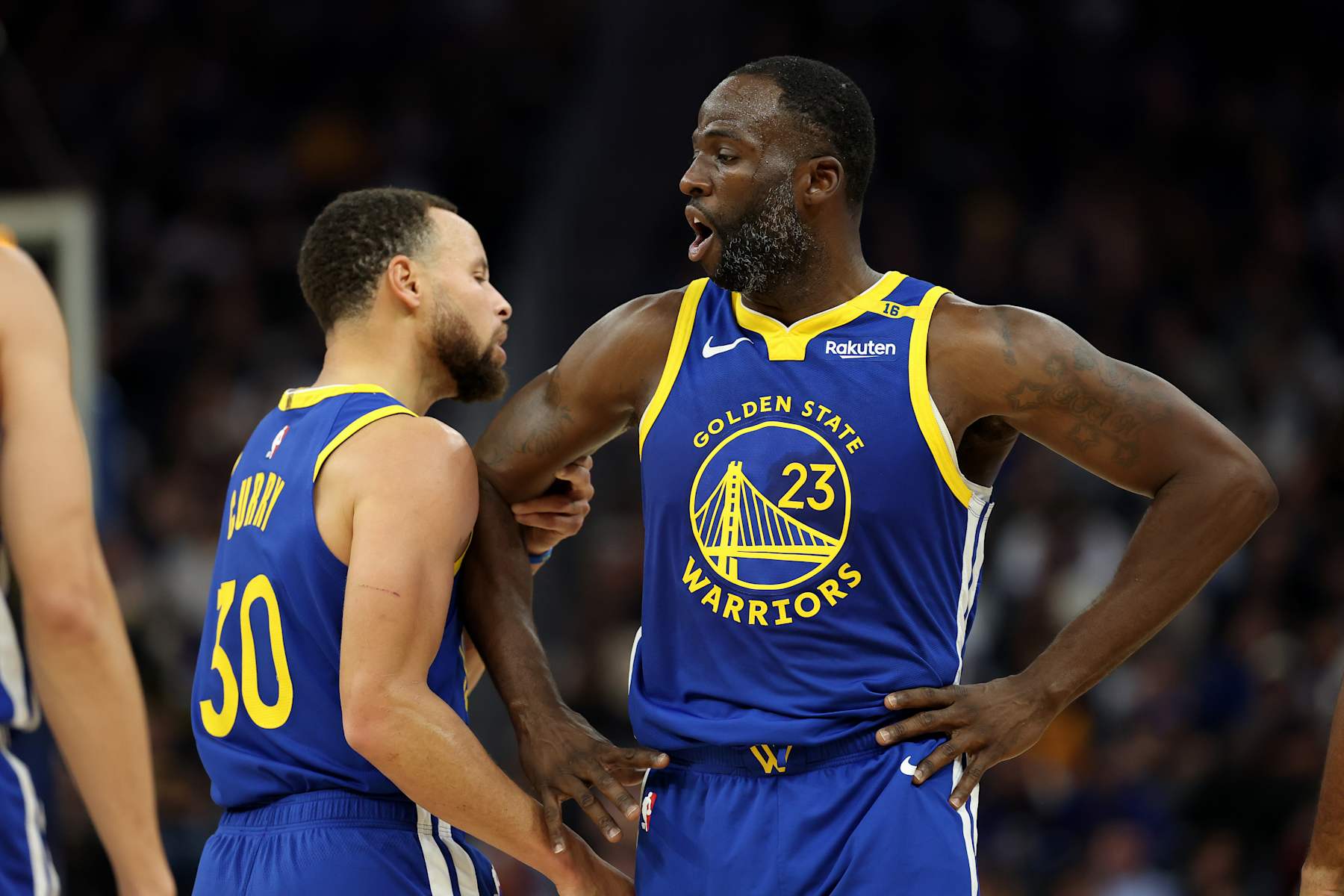 SAN FRANCISCO, CALIFORNIA - DECEMBER 06: Stephen Curry #30 holds back Draymond Green #23 of the Golden State Warriors after Green got called for a technical foul against the Minnesota Timberwolves in the first half at Chase Center on December 06, 2024 in San Francisco, California. NOTE TO USER: User expressly acknowledges and agrees that, by downloading and/or using this photograph, user is consenting to the terms and conditions of the Getty Images License Agreement.   (Photo by Ezra Shaw/Getty Images)
