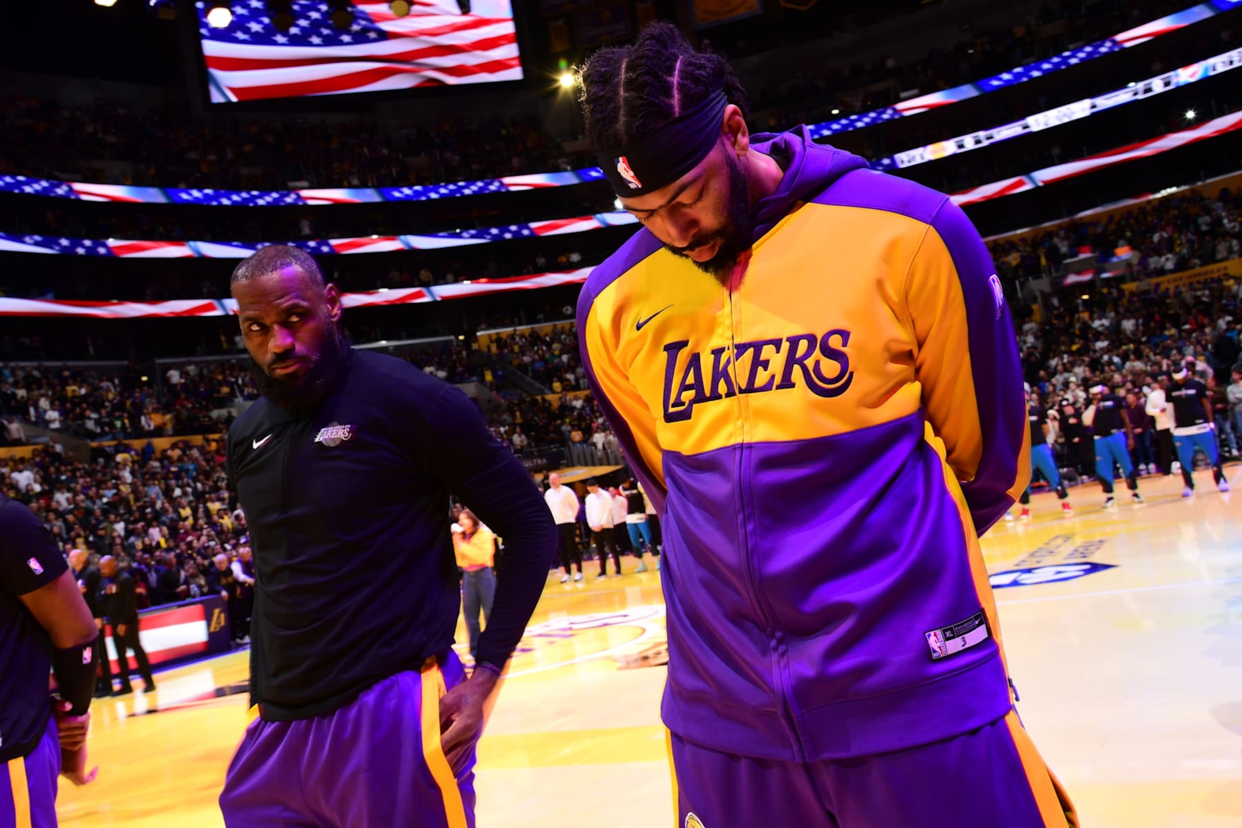 LOS ANGELES, CA - NOVEMBER 29: Anthony Davis #3 and LeBron James #23 of the Los Angeles Lakers stands for the National Anthem before the game against the Oklahoma City Thunder during a Emirates NBA Cup game on October 22, 2024 at Crypto.Com Arena in Los Angeles, California. NOTE TO USER: User expressly acknowledges and agrees that, by downloading and/or using this Photograph, user is consenting to the terms and conditions of the Getty Images License Agreement. Mandatory Copyright Notice: Copyright 2024 NBAE (Photo by Adam Pantozzi/NBAE via Getty Images)