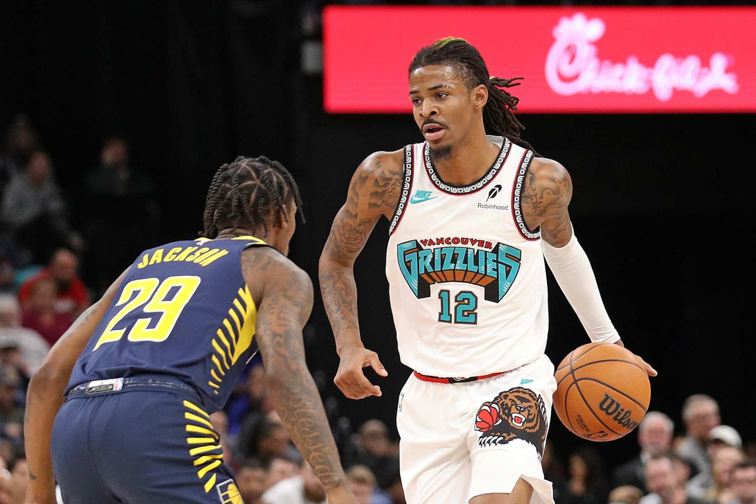 MEMPHIS, TENNESSEE - DECEMBER 01: Ja Morant #12 of the Memphis Grizzlies handles the ball against Quenton Jackson #29 of the Indiana Pacers during the game at FedExForum on December 01, 2024 in Memphis, Tennessee. NOTE TO USER: User expressly acknowledges and agrees that, by downloading and or using this photograph, User is consenting to the terms and conditions of the Getty Images License Agreement. (Photo by Justin Ford/Getty Images)
