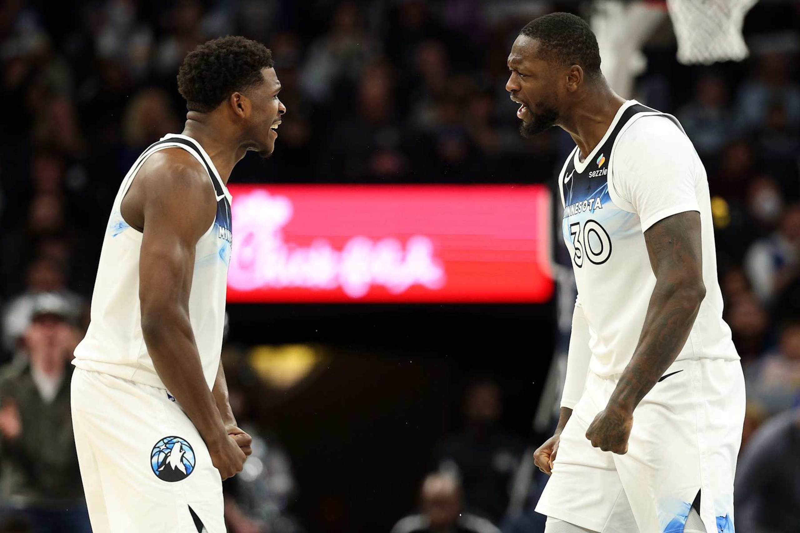 MINNEAPOLIS, MINNESOTA - NOVEMBER 27: Julius Randle #30 celebrates with Anthony Edwards #5 of the Minnesota Timberwolves in the fourth quarter against the Sacramento Kings at Target Center on November 27, 2024 in Minneapolis, Minnesota. The Kings defeated the Timberwolves 115-104. NOTE TO USER: User expressly acknowledges and agrees that, by downloading and or using this photograph, User is consenting to the terms and conditions of the Getty Images License Agreement. (Photo by David Berding/Getty Images)