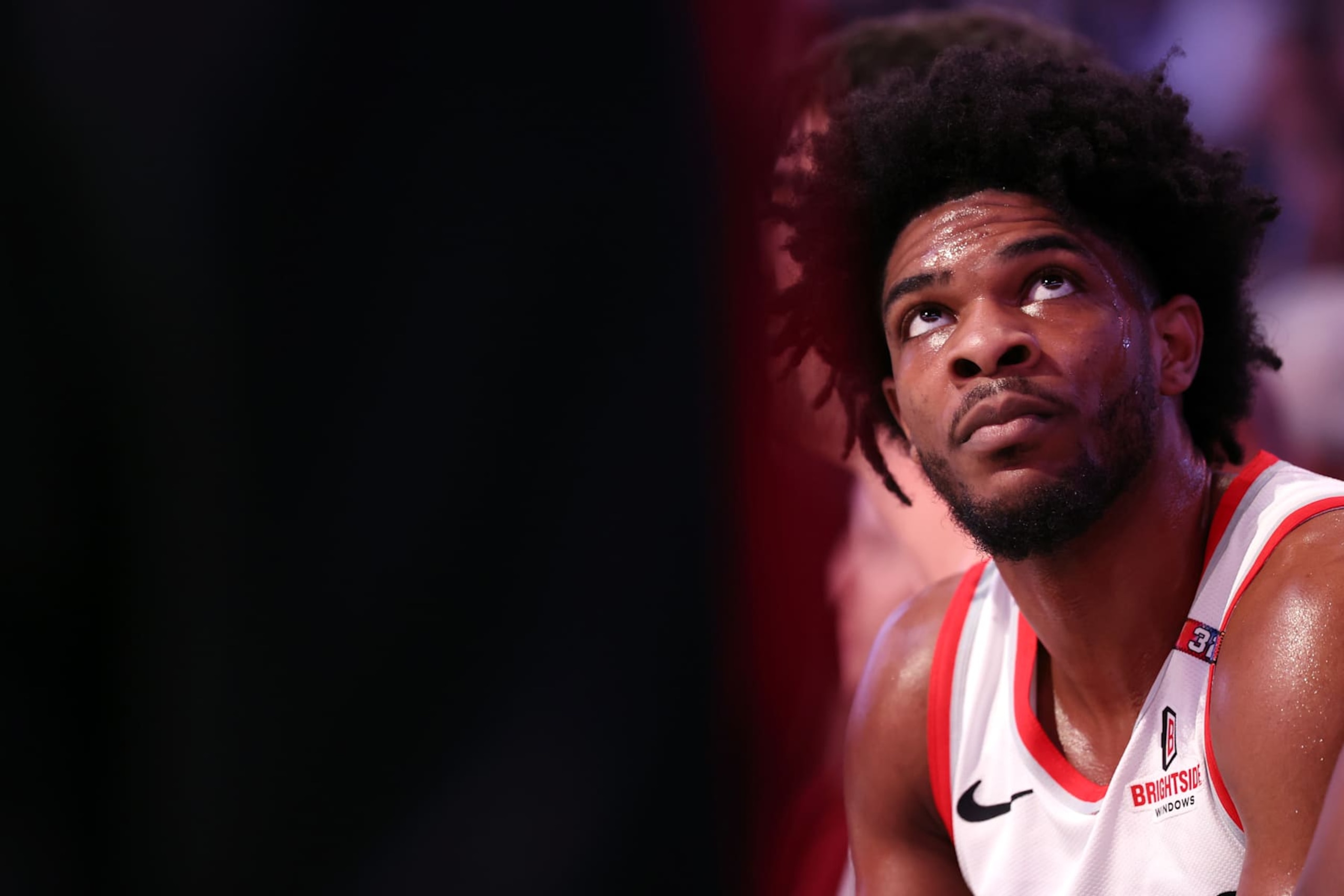 PHOENIX, ARIZONA - DECEMBER 15: Scoot Henderson #00 of the Portland Trail Blazers sits on the bench during the first half against the Phoenix Suns at Footprint Center on December 15, 2024 in Phoenix, Arizona. NOTE TO USER: User expressly acknowledges and agrees that, by downloading and or using this photograph, User is consenting to the terms and conditions of the Getty Images License Agreement.  (Photo by Chris Coduto/Getty Images)