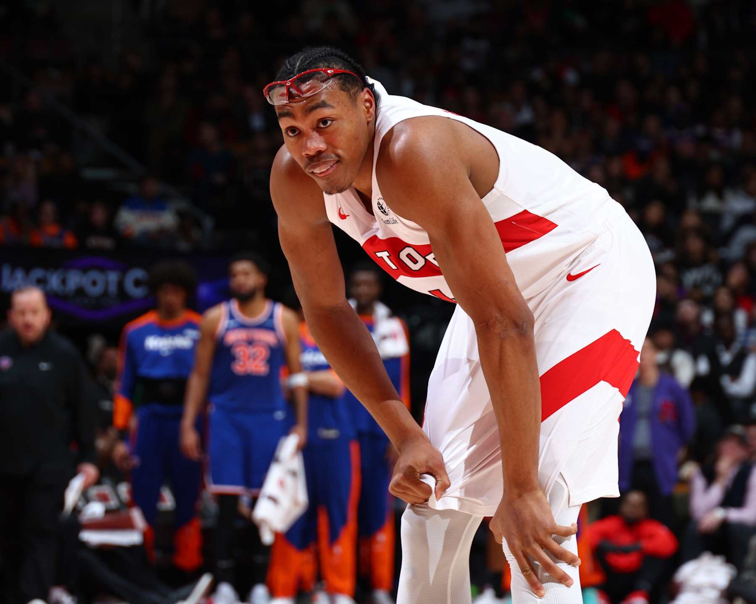 TORONTO, CANADA - DECEMBER 9: Scottie Barnes #4 of the Toronto Raptors looks on during the game against the New York Knicks on December 9, 2024 at the Scotiabank Arena in Toronto, Ontario, Canada.  NOTE TO USER: User expressly acknowledges and agrees that, by downloading and or using this Photograph, user is consenting to the terms and conditions of the Getty Images License Agreement.  Mandatory Copyright Notice: Copyright 2024 NBAE (Photo by Vaughn Ridley/NBAE via Getty Images)