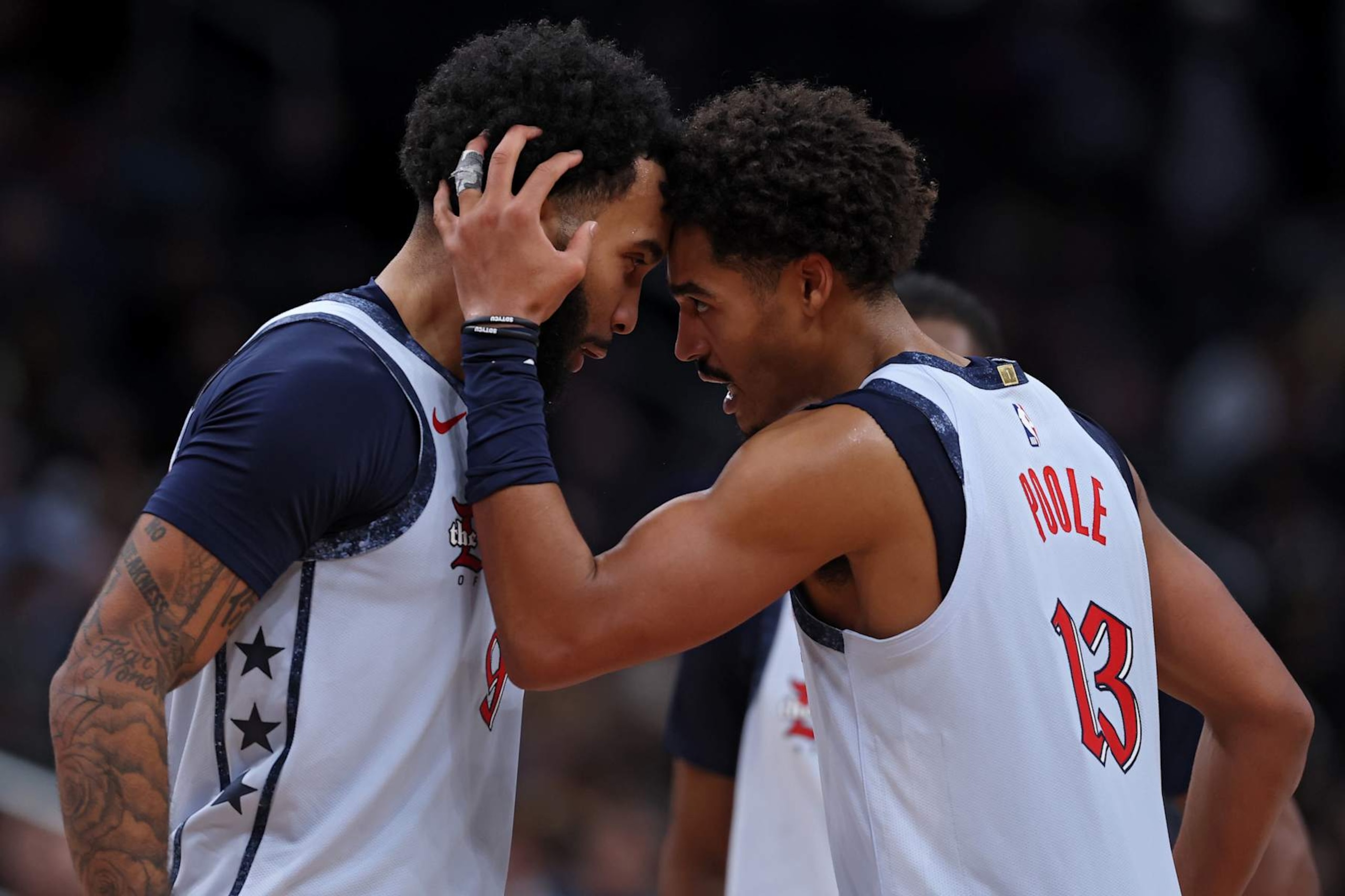 WASHINGTON, DC - DECEMBER 07: Jordan Poole #13 and Justin Champagnie #9 of the Washington Wizards celebrate against the Denver Nuggets during the second half at Capital One Arena on December 7, 2024 in Washington, DC. NOTE TO USER: User expressly acknowledges and agrees that, by downloading and or using this photograph, User is consenting to the terms and conditions of the Getty Images License Agreement. (Photo by Patrick Smith/Getty Images)