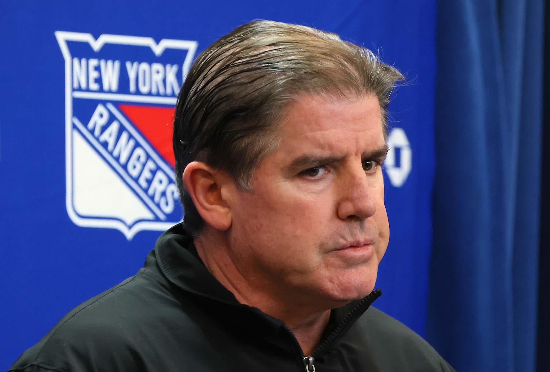 NEW YORK, NEW YORK - NOVEMBER 30: Head coach Peter Laviolette of the New York Rangers speaks with the media prior to the game against the Montreal Canadiens at Madison Square Garden on November 30, 2024 in New York City. (Photo by Bruce Bennett/Getty Images)