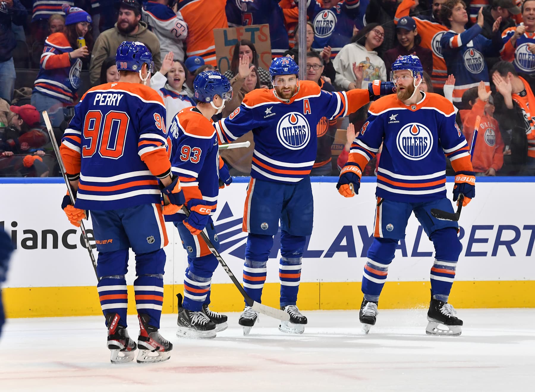 EDMONTON, CANADA - DECEMBER 16: Leon Draisaitl #29, Corey Perry #90, Ryan Nugent-Hopkins #93 and Mattias Ekholm #14 of the Edmonton Oilers celebrate a second-period goal against the Florida Panthers during the game at Rogers Place on December 16, 2024, in Edmonton, Alberta, Canada. (Photo by Andy Devlin/NHLI via Getty Images)