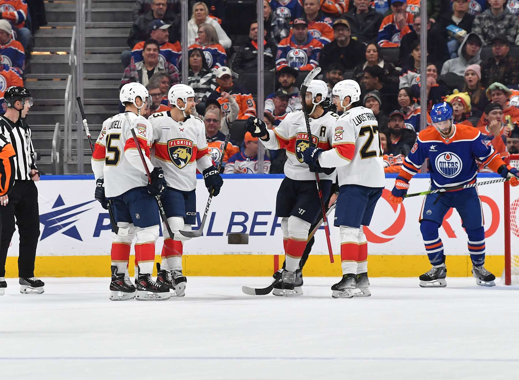 EDMONTON, CANADA - DECEMBER 16: Anton Lundell #15, Sam Reinhart #13, Aaron Ekblad #5 and Eetu Luostarinen #27 of the Florida Panthers celebrate a second-period goal against the Edmonton Oilers during the game at Rogers Place on December 16, 2024, in Edmonton, Alberta, Canada. (Photo by Andy Devlin/NHLI via Getty Images)