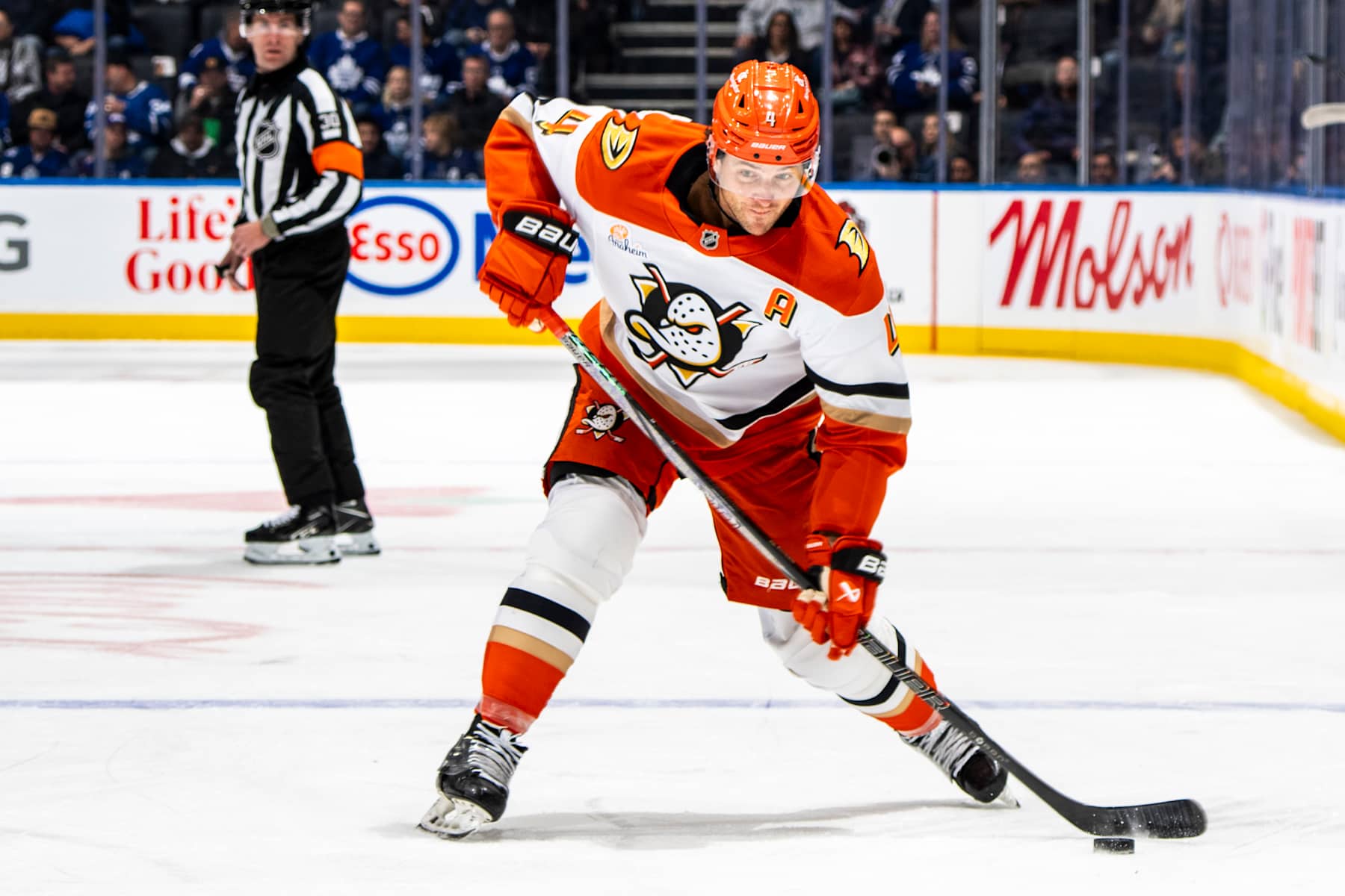TORONTO, ON - DECEMBER 12: Cam Fowler #4 of the Anaheim Ducks shoots the puck against the Toronto Maple Leafs at the Scotiabank Arena on December 12, 2024 in Toronto, Ontario, Canada. (Photo by Kevin Sousa/NHLI via Getty Images)