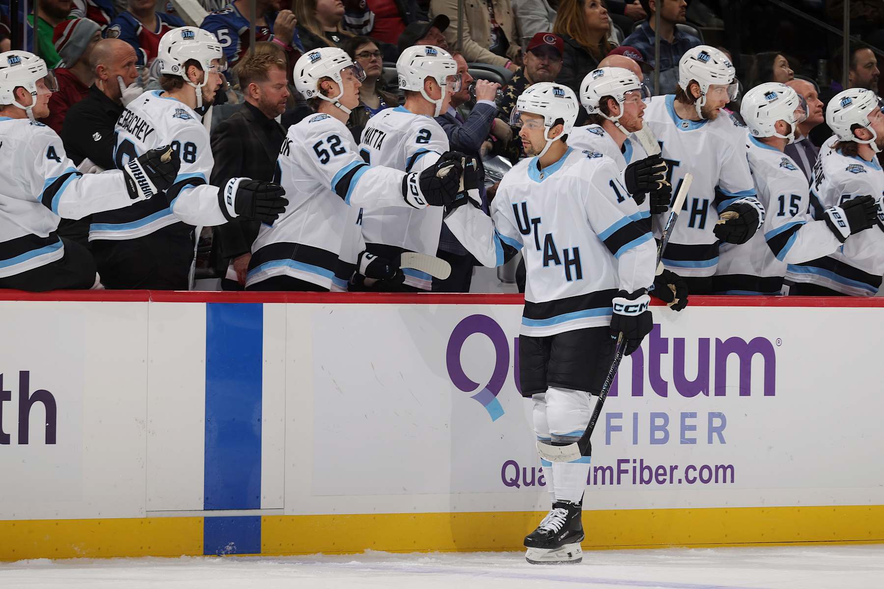 DENVER, COLORADO - DECEMBER 12: Dylan Guenther #11 of the Utah Hockey Club celebrates a goal against the Colorado Avalanche at Ball Arena on December 12, 2024 in Denver, Colorado. (Photo by Michael Martin/NHLI via Getty Images)