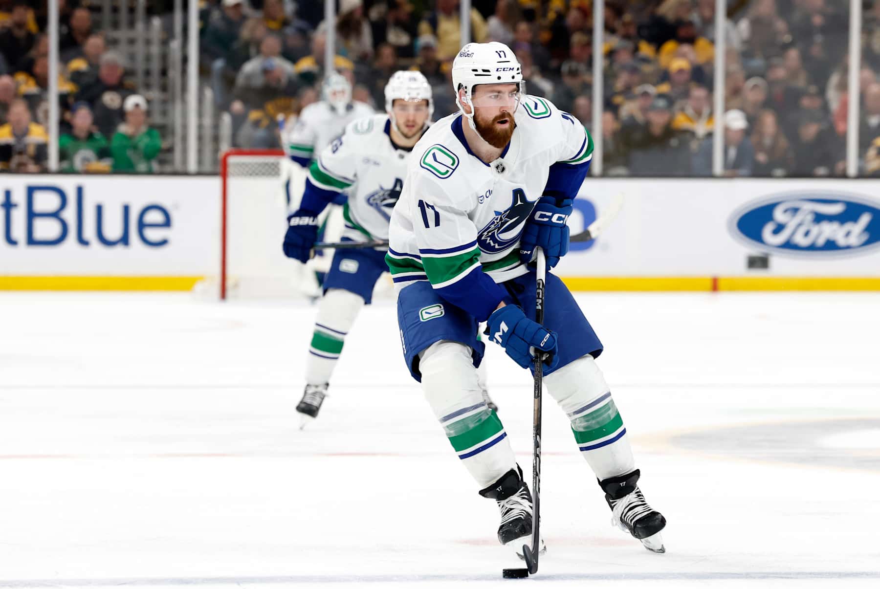 BOSTON, MA - NOVEMBER 26: Vancouver Canucks defenseman Filip Hronek (17) gains the blue line during a game between the Boston Bruins and the Vancouver Canucks on November 26, 2024, at TD Garden in Boston, Massachusetts. (Photo by Fred Kfoury III/Icon Sportswire via Getty Images)