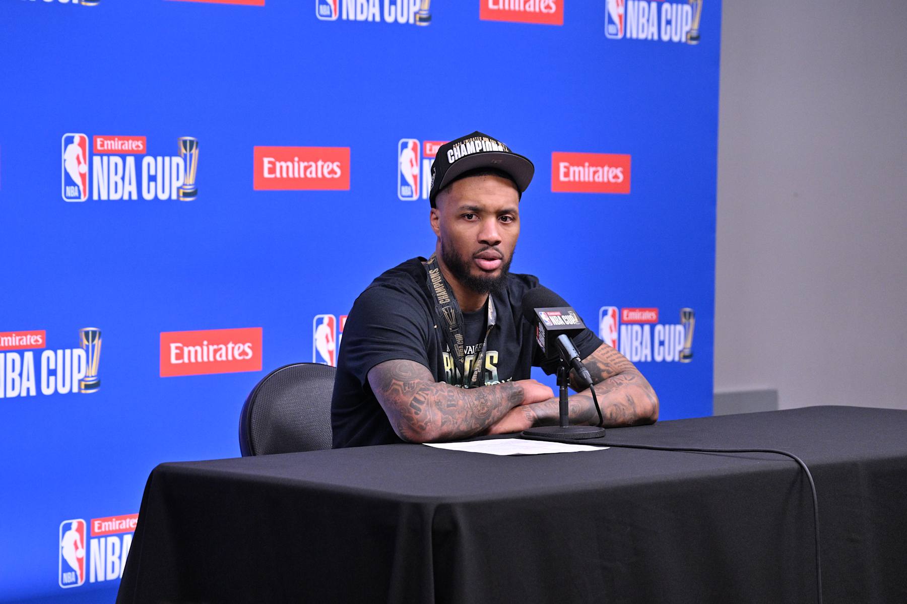 LAS VEGAS, NV - DECEMBER 17: Damian Lillard #0 of the Milwaukee Bucks talks to the media after winning the Emirates NBA Cup Championship against the Oklahoma City Thunder during the Emirates NBA Cup Championship game on December 17, 2024 at T-Mobile Arena in Las Vegas, Nevada. NOTE TO USER: User expressly acknowledges and agrees that, by downloading and/or using this Photograph, user is consenting to the terms and conditions of the Getty Images License Agreement. Mandatory Copyright Notice: Copyright 2024 NBAE (Photo by Tom O'Connor/NBAE via Getty Images)