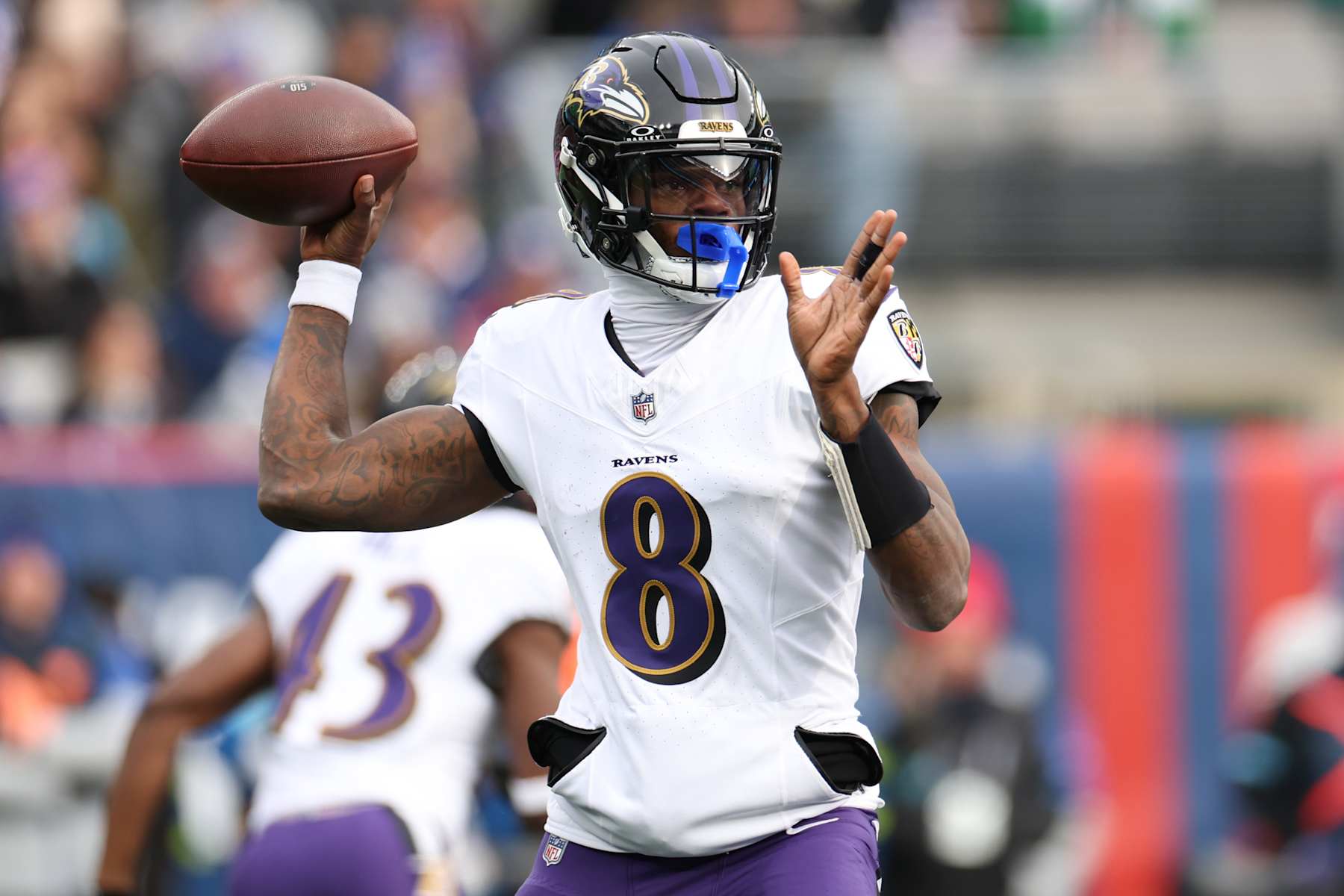 EAST RUTHERFORD, NEW JERSEY - DECEMBER 15: Lamar Jackson #8 of the Baltimore Ravens throws a pass against the New York Giants during the first quarter at MetLife Stadium on December 15, 2024 in East Rutherford, New Jersey. (Photo by Luke Hales/Getty Images)