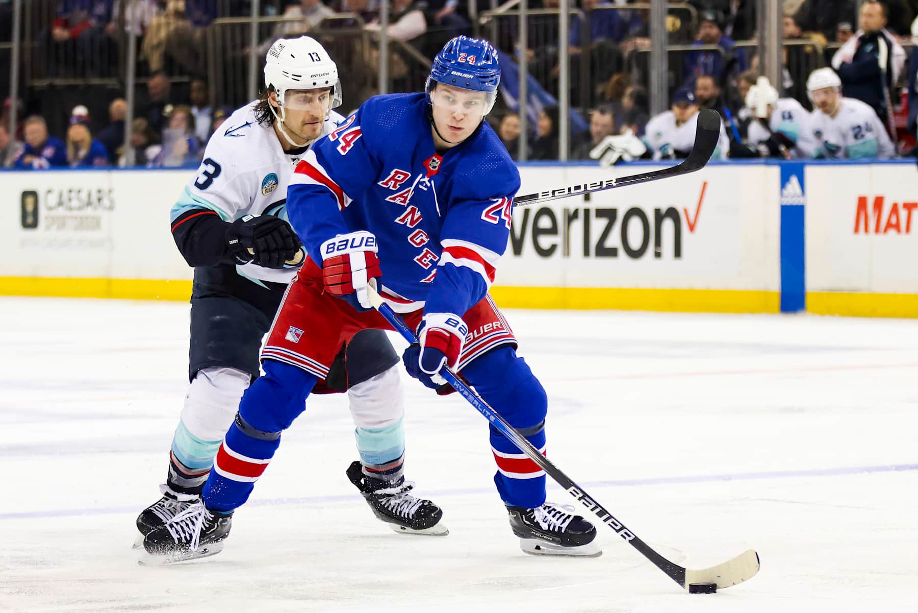 NEW YORK, NY - JANUARY 16: New York Rangers Right Wing Kaapo Kakko (24) skates against Seattle Kraken Right Wing Brandon Tanev (13) during the National Hockey League game between the Seattle Kraken and the New York Rangers on January 16, 2024 at Madison Square Garden in New York, NY. (Photo by Joshua Sarner/Icon Sportswire via Getty Images)