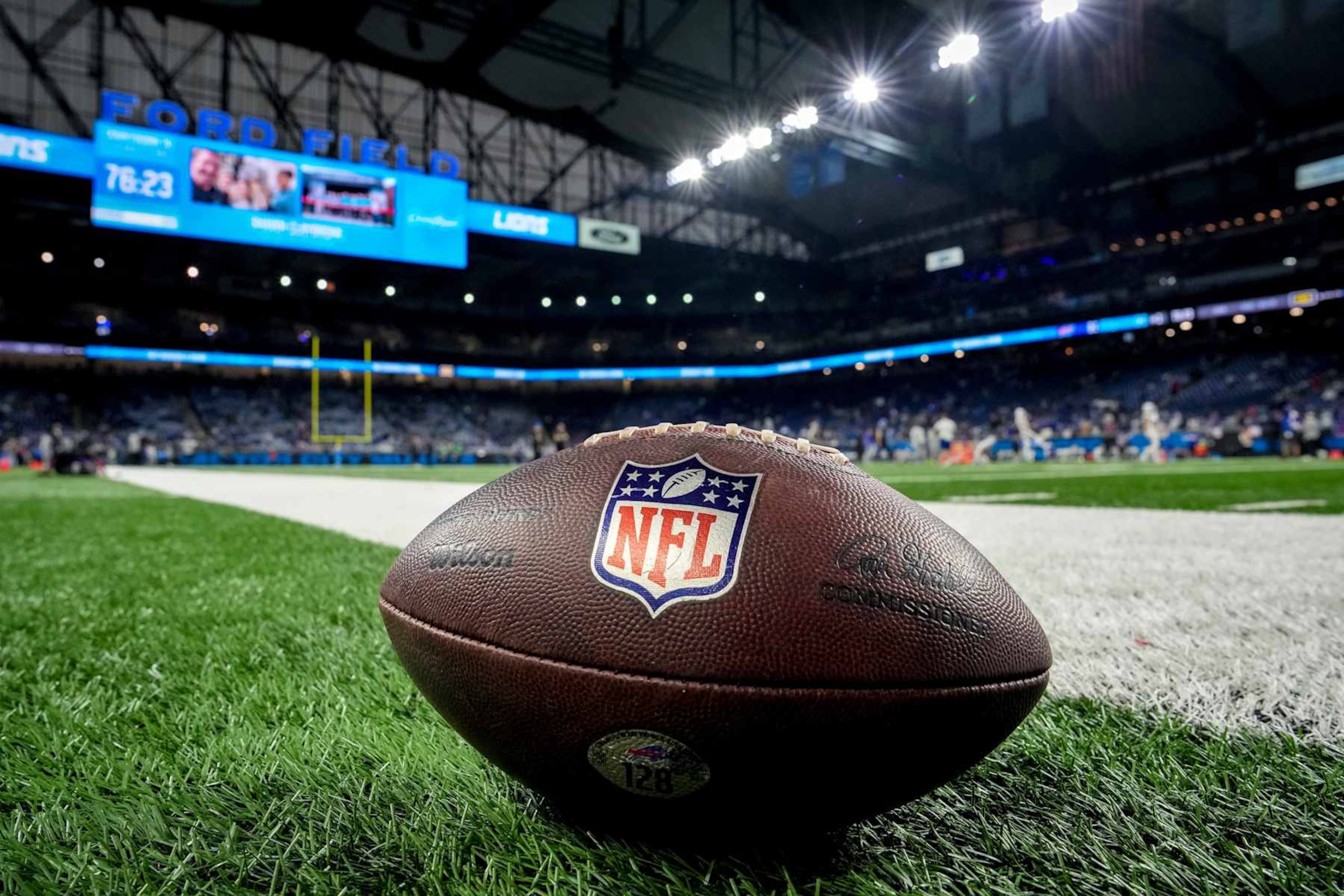 DETROIT, MICHIGAN - DECEMBER 15: A general view of a Wilson brand NFL football with the logos on the field before the game between the Detroit Lions and Buffalo Bills at Ford Field on December 15, 2024 in Detroit, Michigan. (Photo by Nic Antaya/Getty Images)