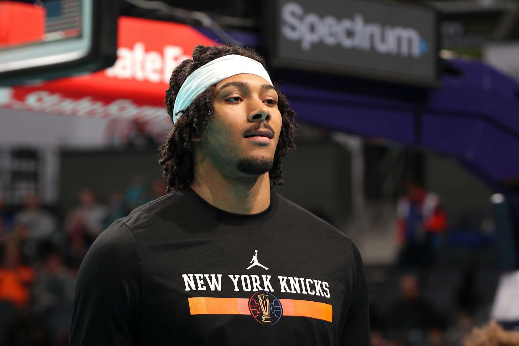 CHARLOTTE, NC - NOVEMBER 29: Jericho Sims #20 of the New York Knicks looks on before the game against the Charlotte Hornets during the Emirates NBA Cup game on November 29, 2024 at Spectrum Center in Charlotte, North Carolina. NOTE TO USER: User expressly acknowledges and agrees that, by downloading and or using this photograph, User is consenting to the terms and conditions of the Getty Images License Agreement. Mandatory Copyright Notice: Copyright 2024 NBAE (Photo by Kent Smith/NBAE via Getty Images)
