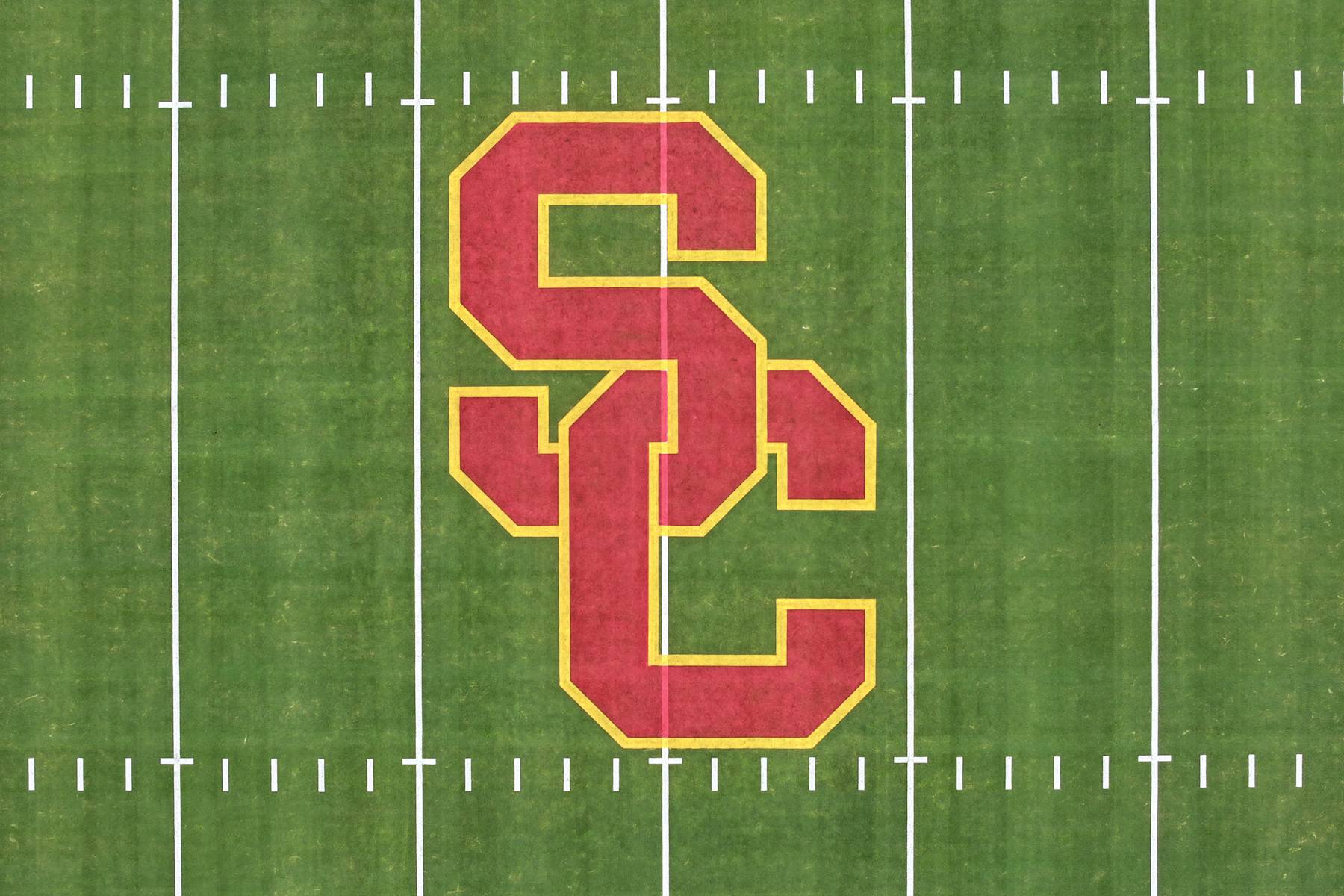 LOS ANGELES, CALIFORNIA - NOVEMBER 29: A general overall aerial view of the football field with the Southern California Trojans USC logo at midfield of the football field at the Los Angeles Memorial Coliseum on November 29, 2024 in Los Angeles, California. (Photo by Kirby Lee/Getty Images)