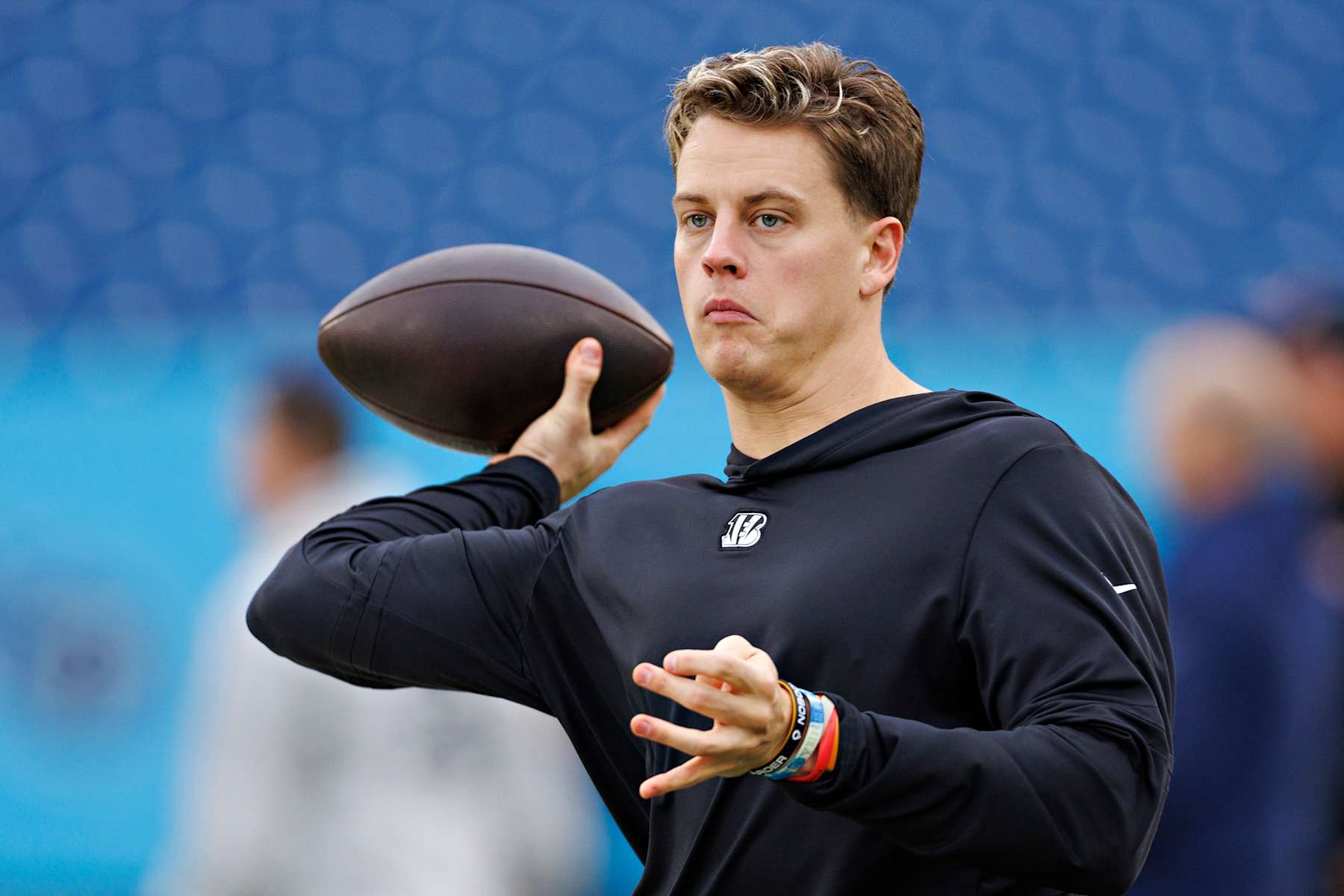 NASHVILLE, TENNESSEE - DECEMBER 15: Joe Burrow #9 of the Cincinnati Bengals warms up before a game against the Tennessee Titans at Nissan Stadium on December 15, 2024 in Nashville, Tennessee. The Bengals defeated the Titans 37-27.  (Photo by Wesley Hitt/Getty Images)