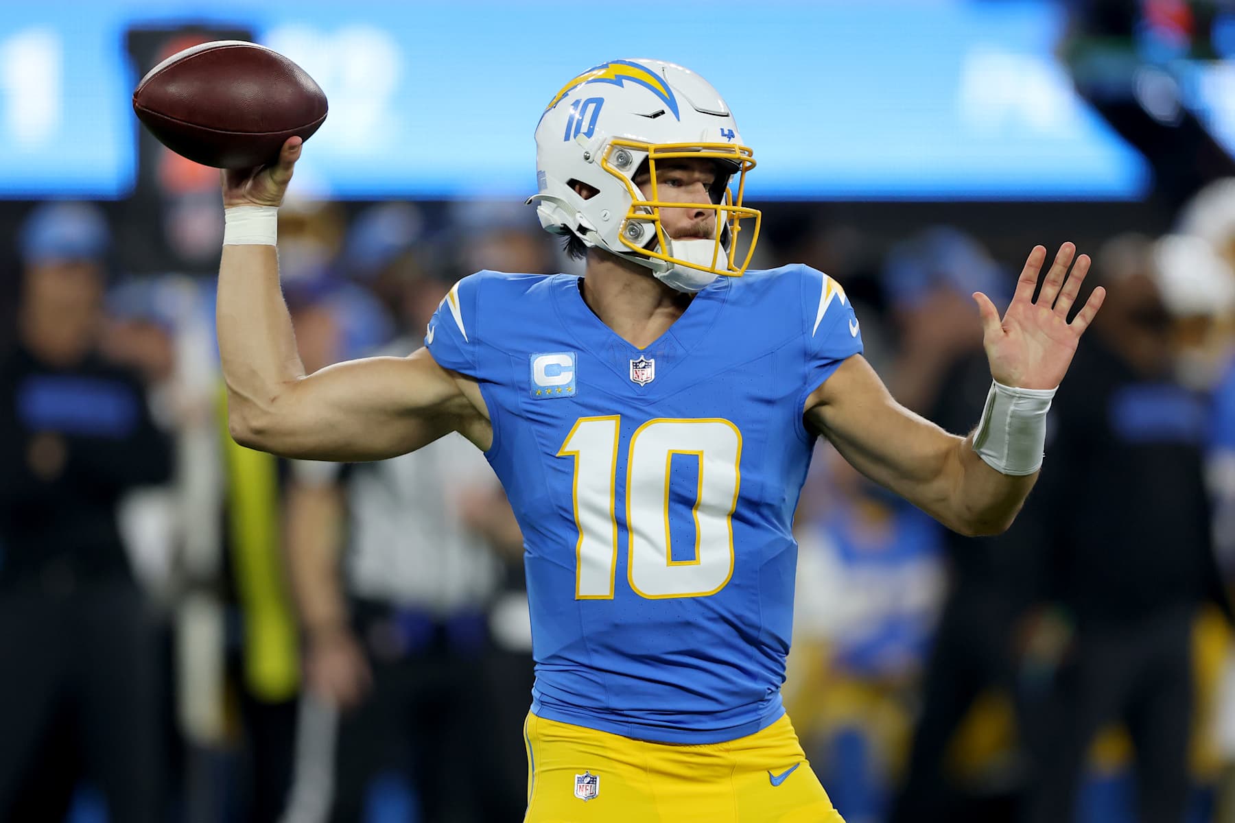 INGLEWOOD, CALIFORNIA - DECEMBER 19: Justin Herbert #10 of the Los Angeles Chargers throws a pass against the Denver Broncos during the first quarter in the game at SoFi Stadium on December 19, 2024 in Inglewood, California. (Photo by Sean M. Haffey/Getty Images)
