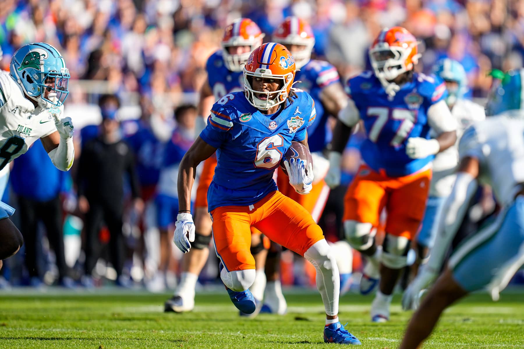 TAMPA, FL - DECEMBER 20: Florida Gators wide receiver Elijhah Badger (6) runs ahead during the Union Home Mortgage Gasparilla Bowl between the Florida Gators and the Tulane Green Wave on December 20, 2024 at Raymond James Stadium in Tampa, Fl. (Photo by Ricky Bowden/Icon Sportswire via Getty Images)