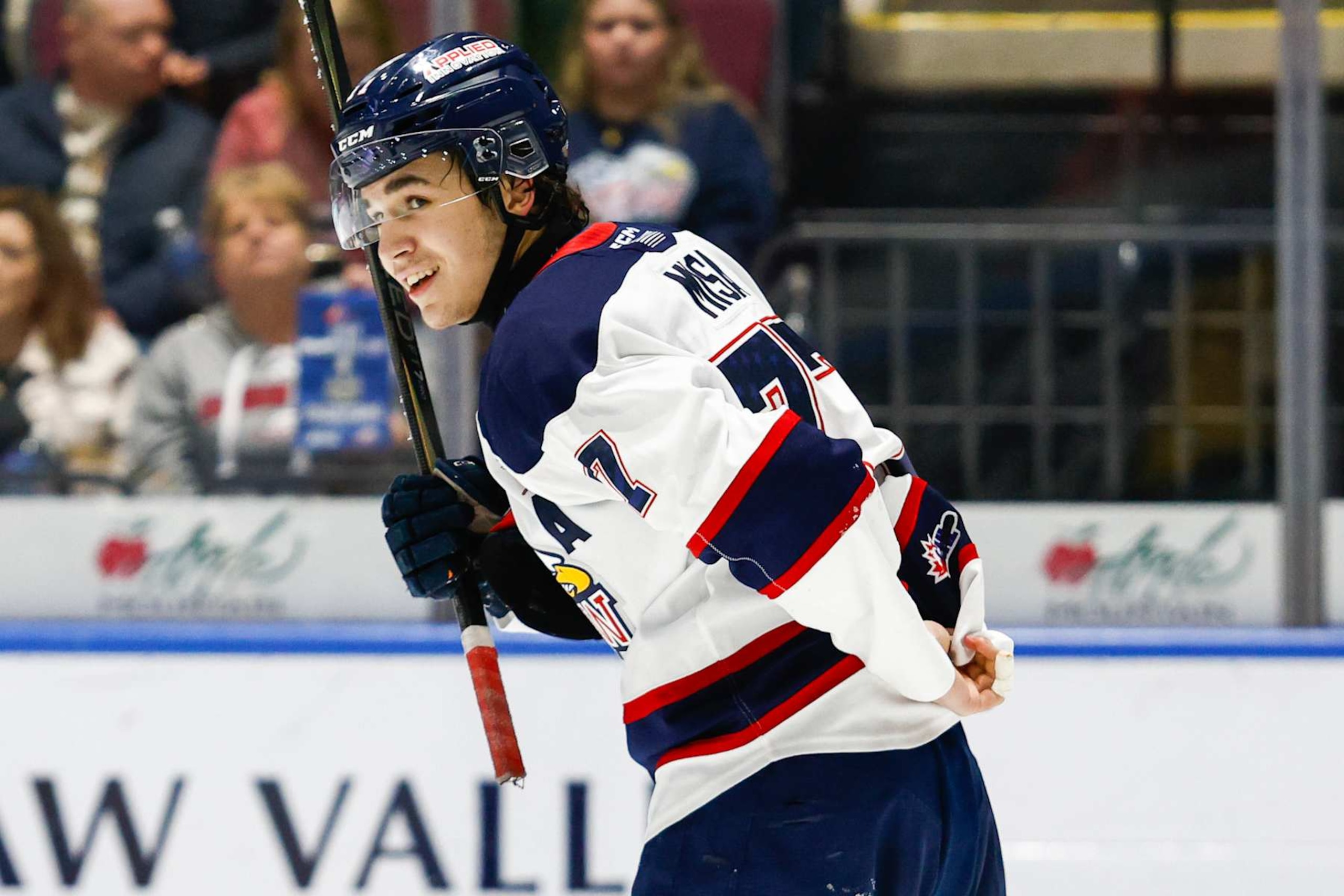 SAGINAW, MI - NOVEMBER 30: Michael Misa #77 of Saginaw smiles after a scrum during a game between Brampton Steelheads and Saginaw Spirit at Dow Event Center on November 30, 2024 in Saginaw, Michigan. (Photo by Michael Miller/ISI Photos/Getty Images)